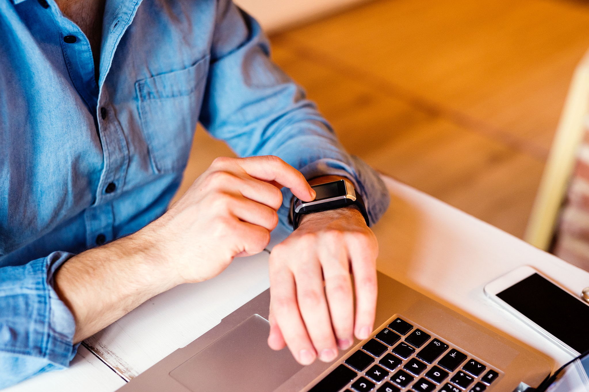 Nikon D4S + Sigma 50mm F1.4 DG HSM Art sample photo. Man working from home on laptop, wearing smartwatch photography