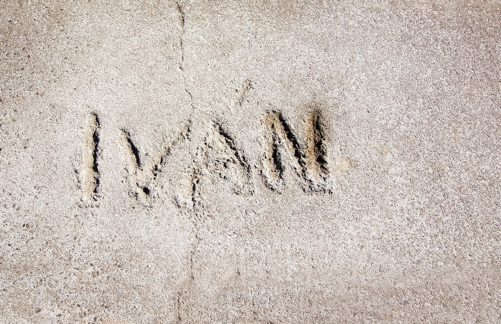 Nikon D7100 + AF Zoom-Nikkor 28-80mm f/3.5-5.6D sample photo. Ivan written in concrete photography