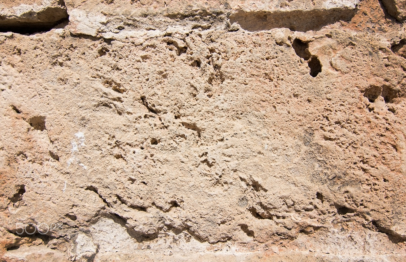 Nikon D7100 + AF Zoom-Nikkor 35-80mm f/4-5.6D sample photo. Stone wall background in honey color photography