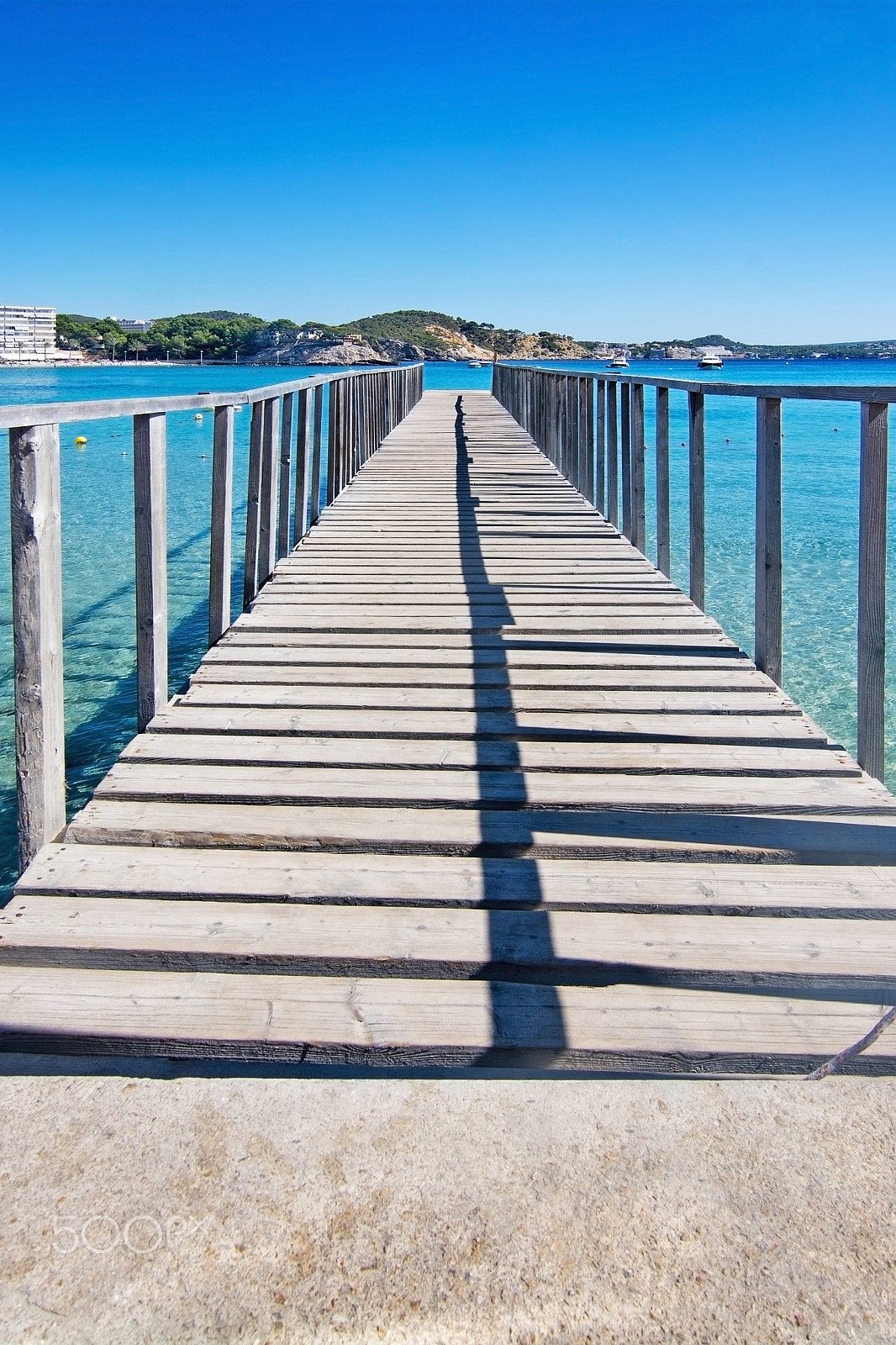 Sigma 18-200mm F3.5-6.3 DC OS HSM sample photo. Empty boat wooden pier photography