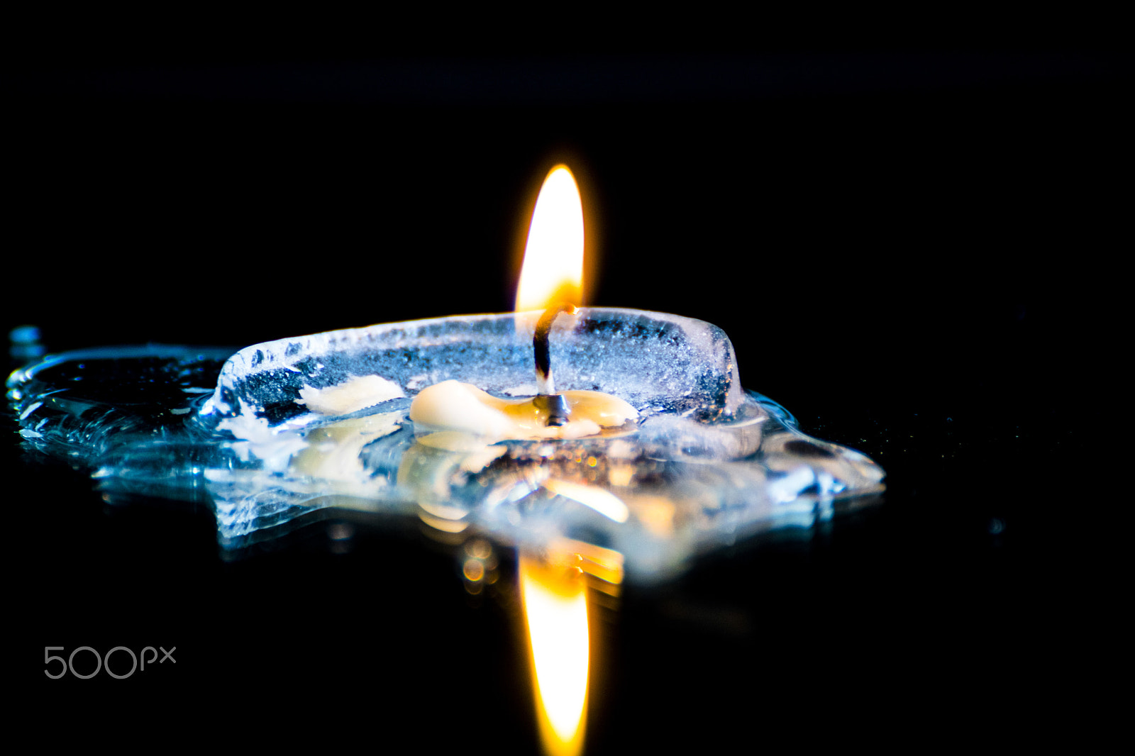 Canon EOS 80D + Tamron SP 70-300mm F4-5.6 Di VC USD sample photo. Candle on ice photography