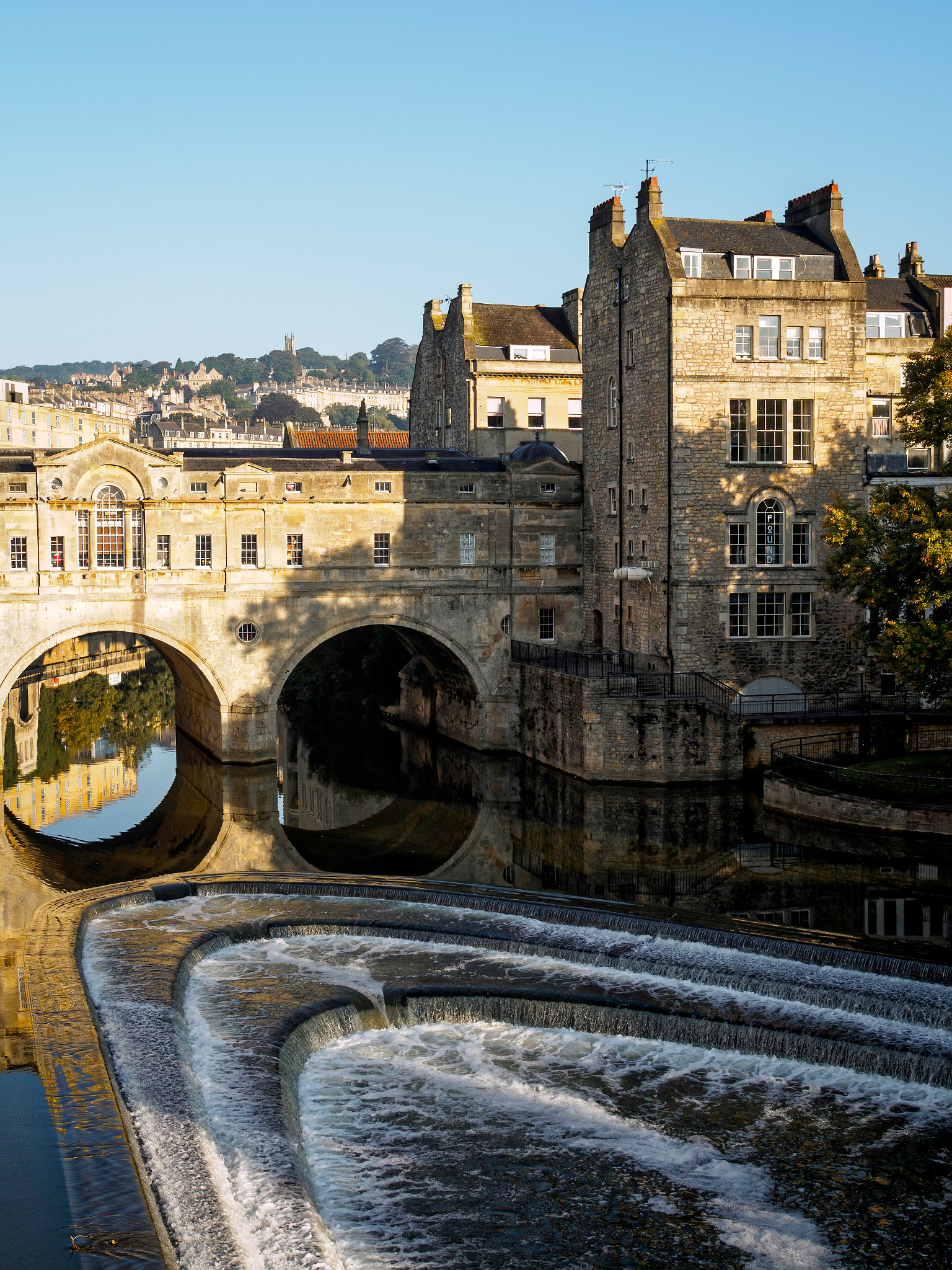 Olympus PEN-F + Olympus M.Zuiko Digital 25mm F1.8 sample photo. View of pulteney bridge and weir in bath photography