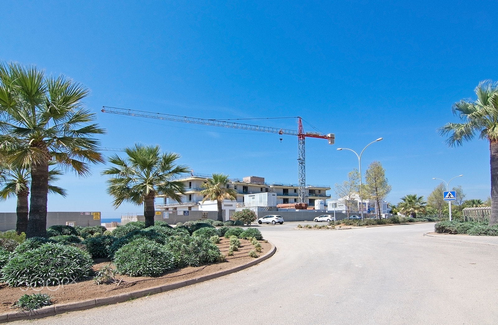 Nikon D7100 + Sigma 18-200mm F3.5-6.3 DC sample photo. Construction site with ocean view photography