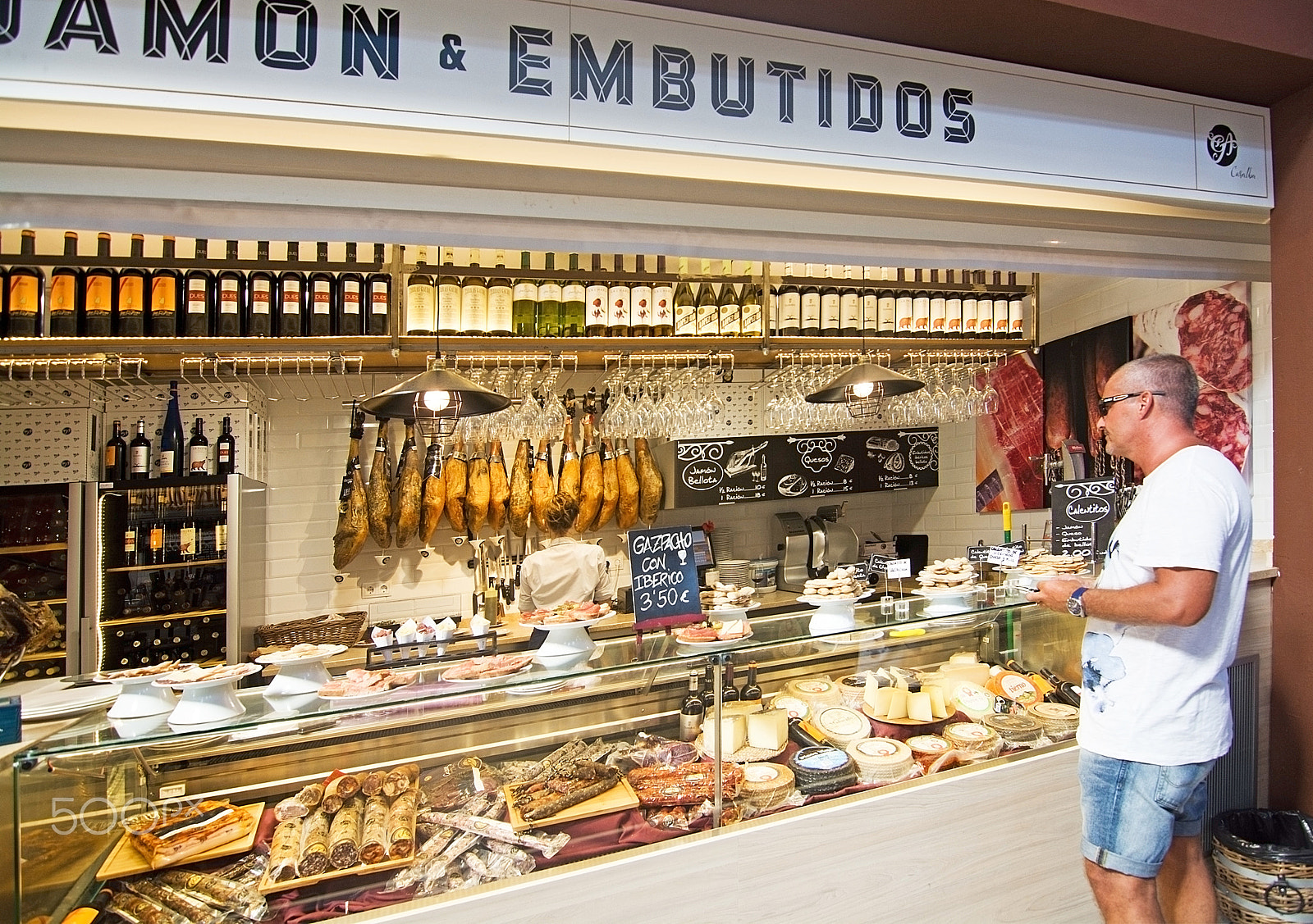 AF Zoom-Nikkor 80-200mm f/4.5-5.6D sample photo. Sant juan market interior ham cheese photography