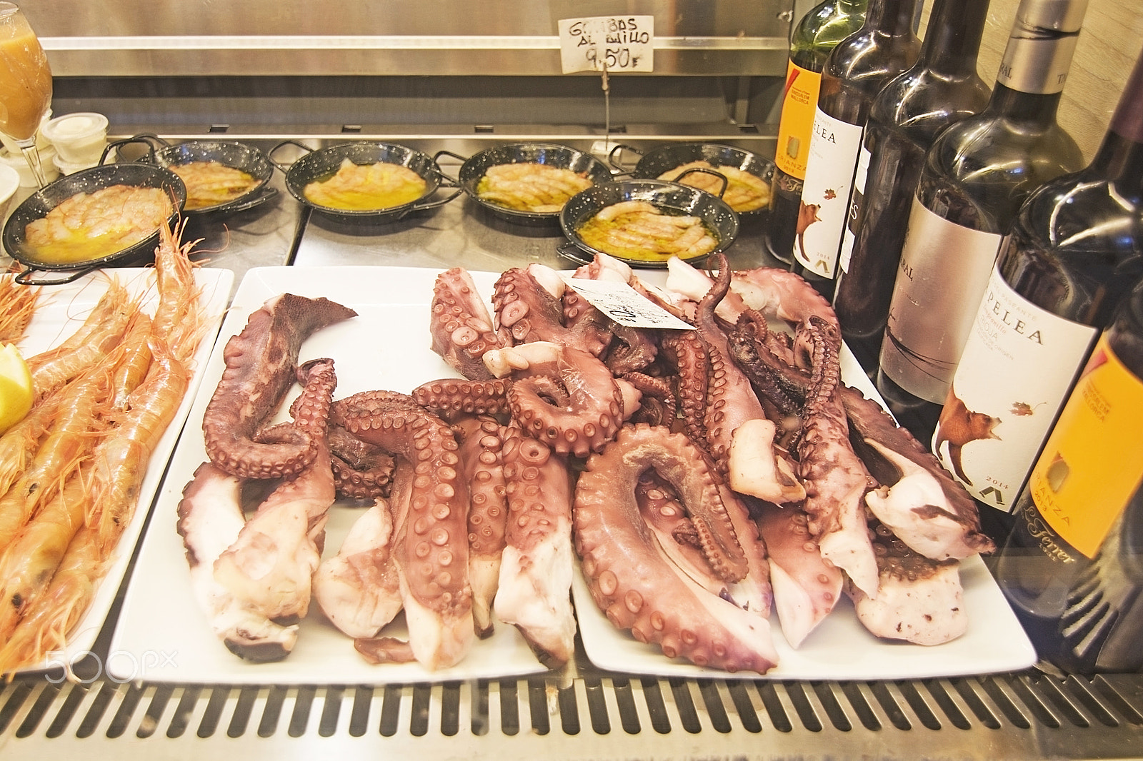 Nikon D7100 + Nikon AF Nikkor 180mm F2.8D ED-IF sample photo. Sant juan market interior octopus photography