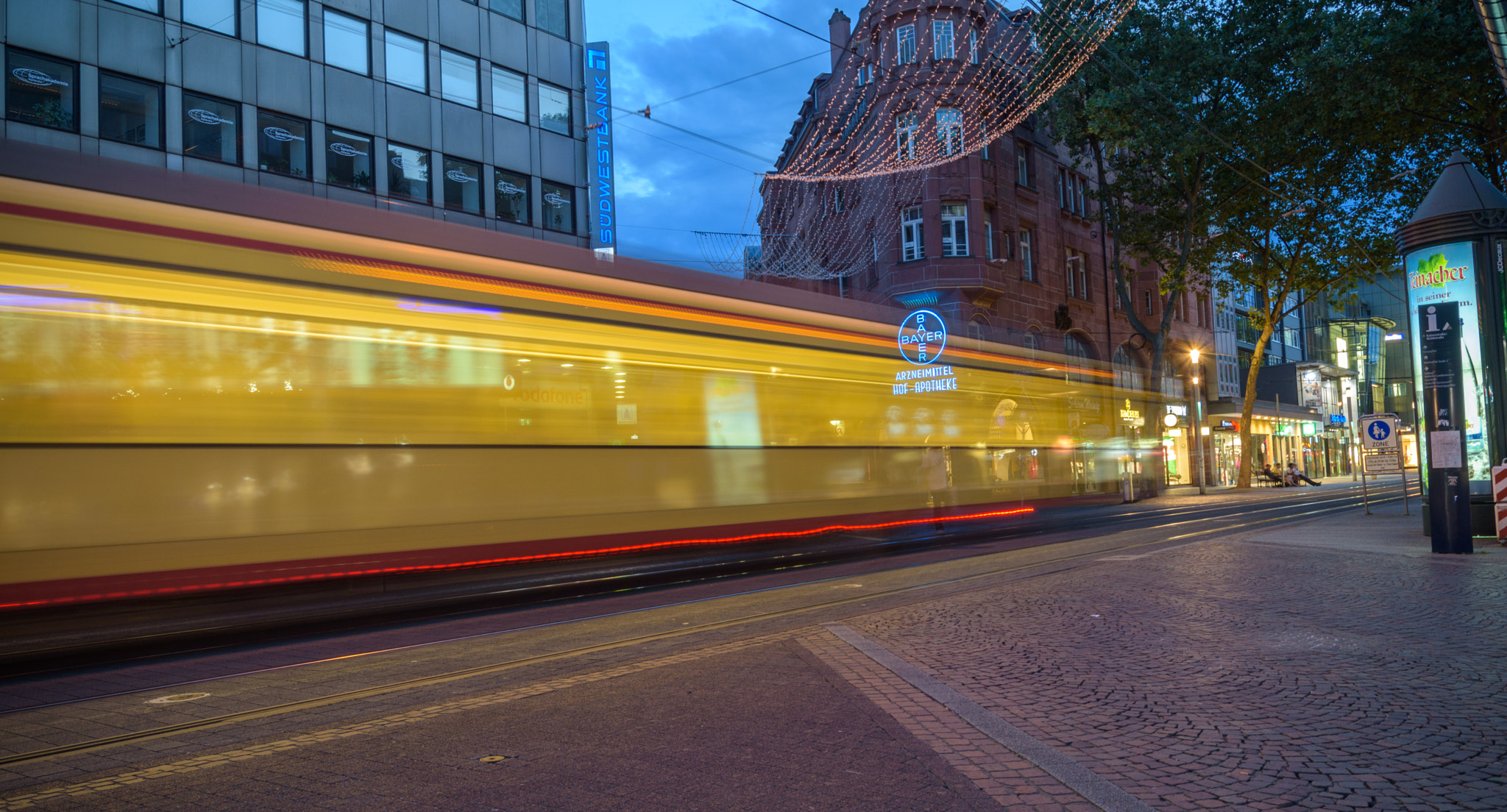 Sigma 17-70mm F2.8-4 DC Macro OS HSM sample photo. Tram in karlsruhe - a long exposure photography
