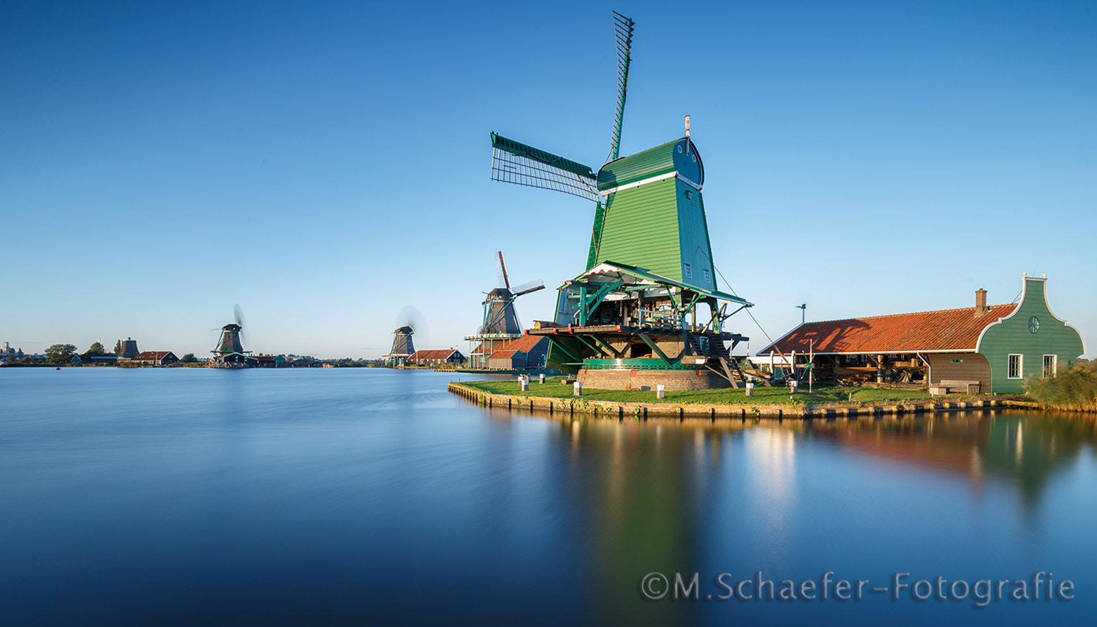 Canon EOS-1D X + Canon EF 16-35mm F4L IS USM sample photo. Dutch windmills with long exposure photography