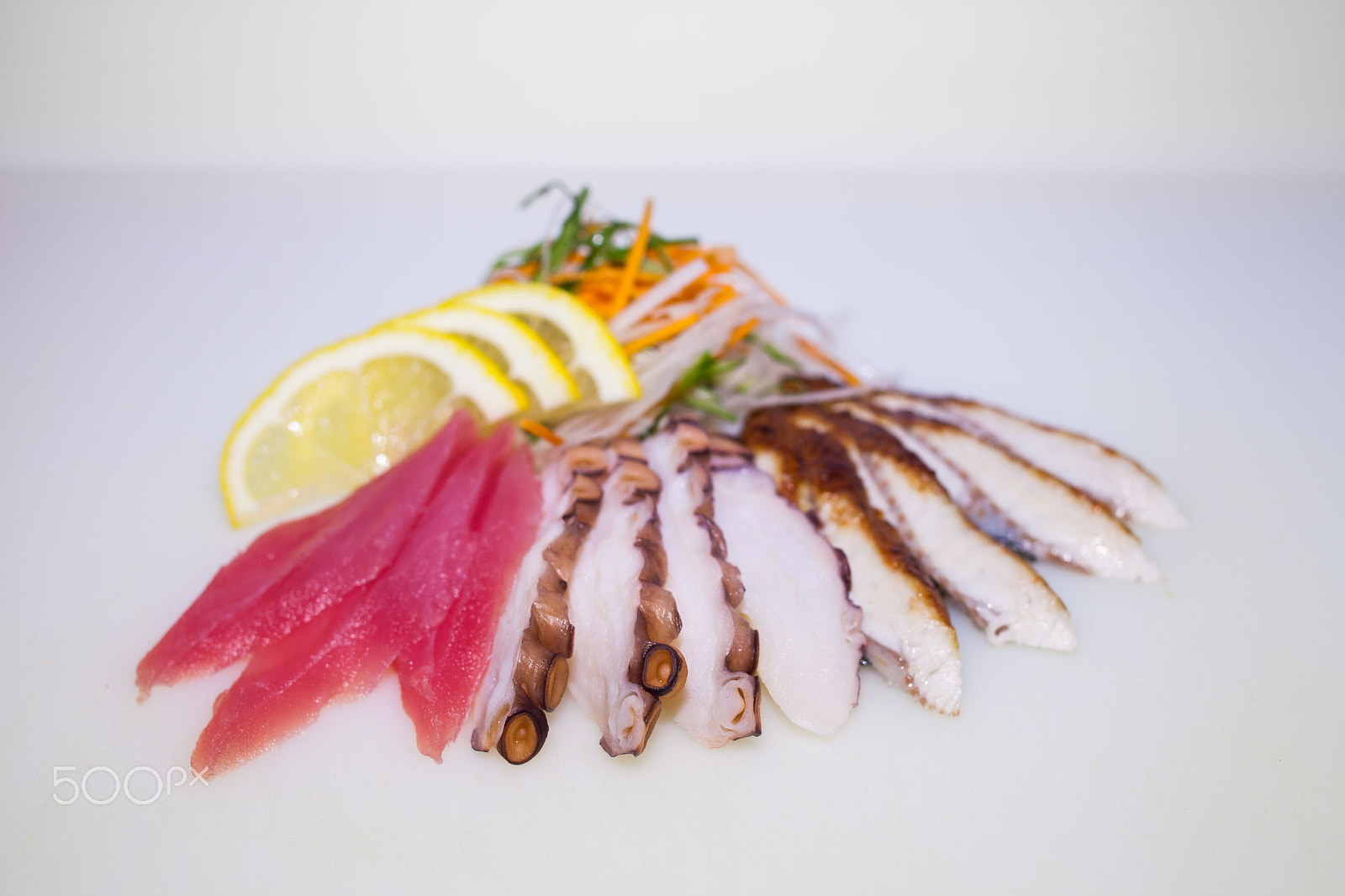 Canon EOS 5D Mark II sample photo. Sashimi mix slices with lemon photography