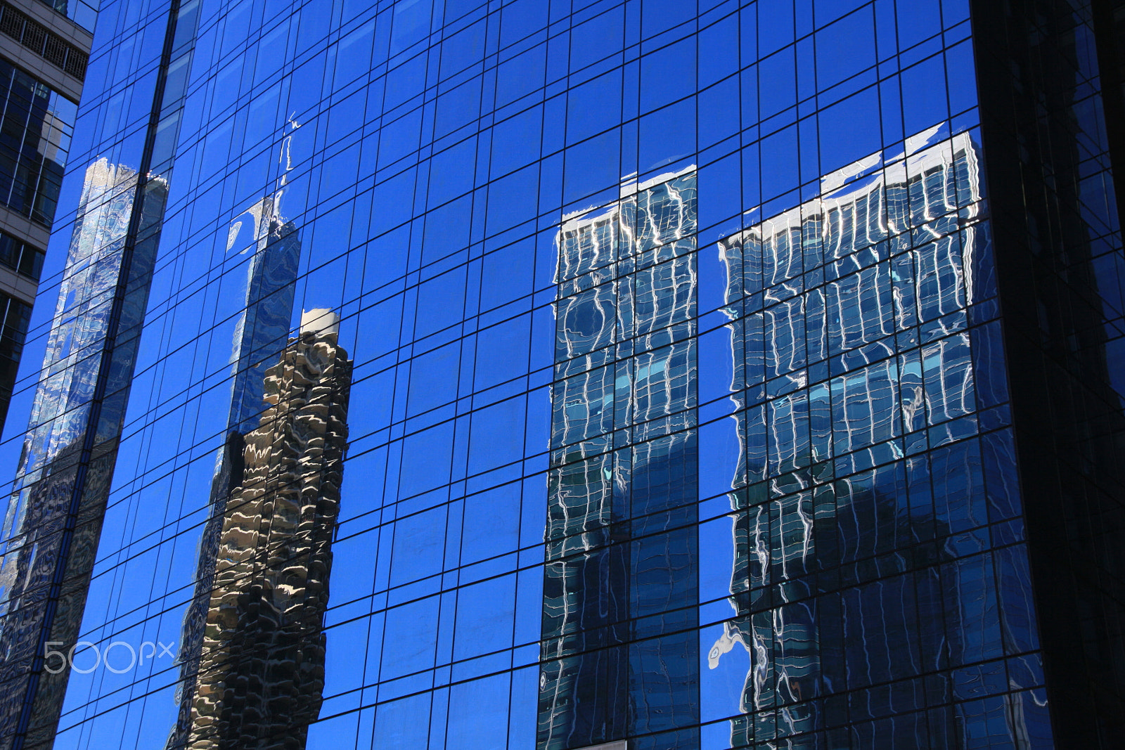 Canon EOS 5D Mark II sample photo. Reflection of skyscrapers on the blu grid photography