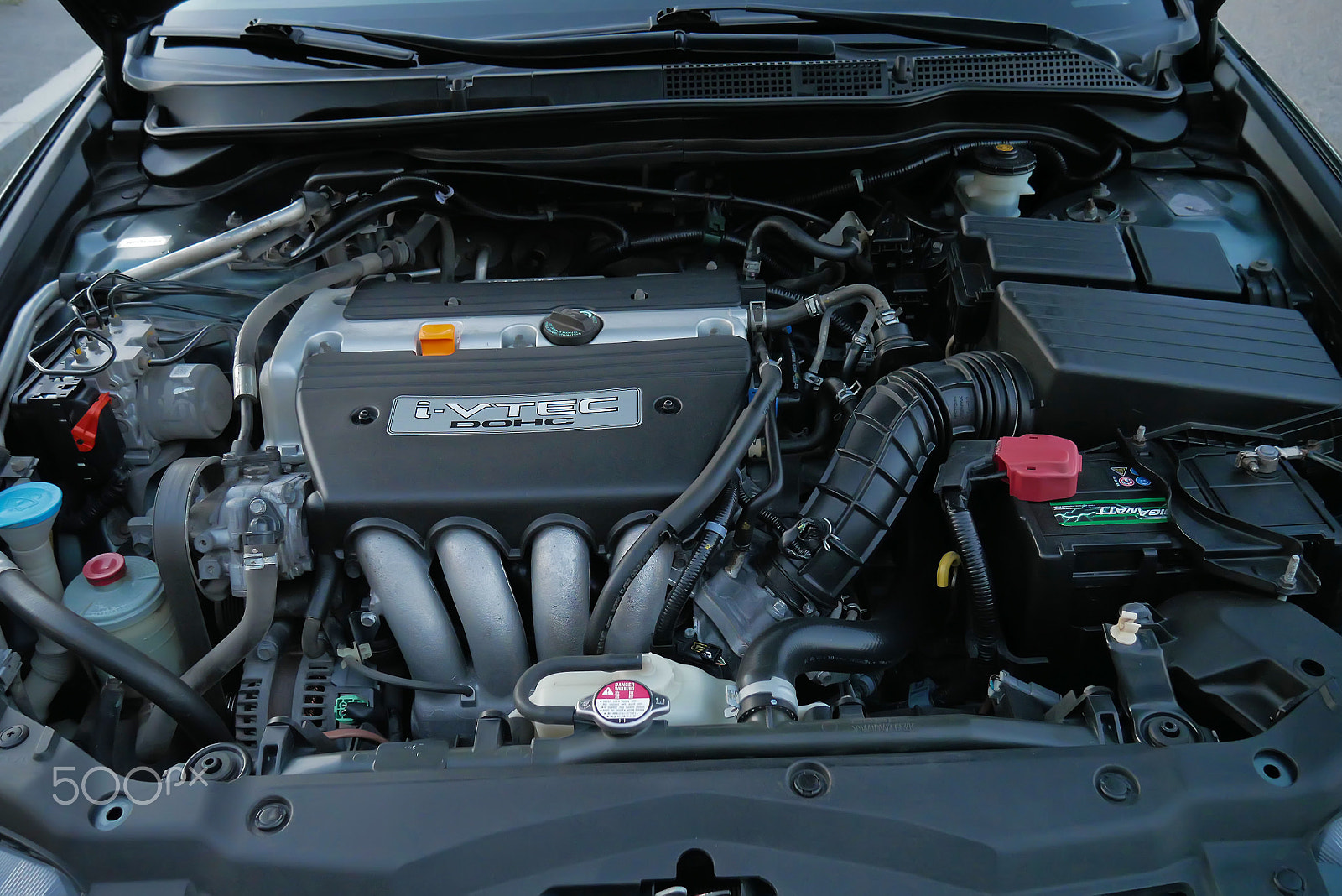 Panasonic Lumix DMC-GX85 (Lumix DMC-GX80 / Lumix DMC-GX7 Mark II) sample photo. Car with open hood photography