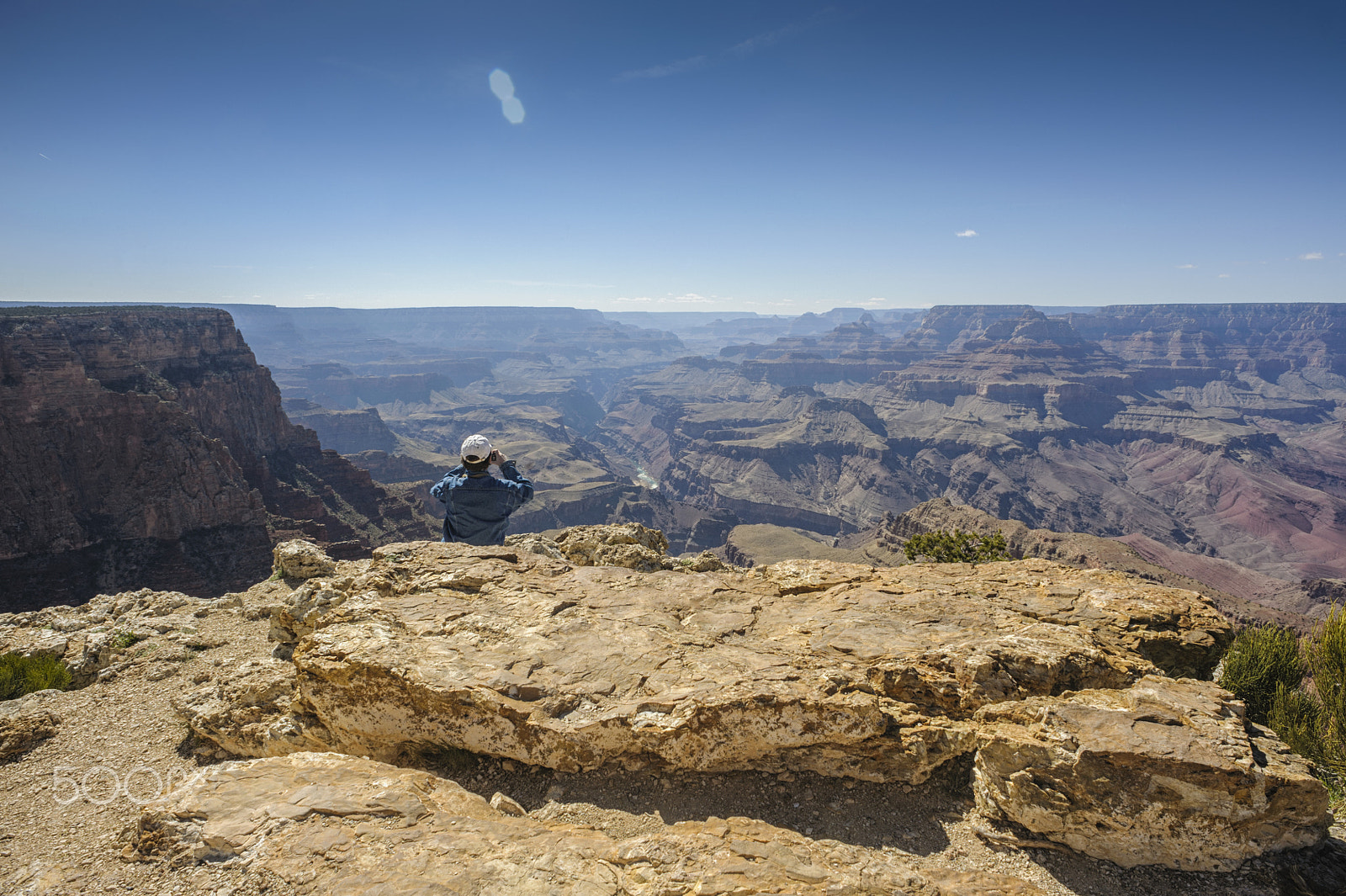 Nikon D700 sample photo. Man takes photo at the edge of grand canyon photography