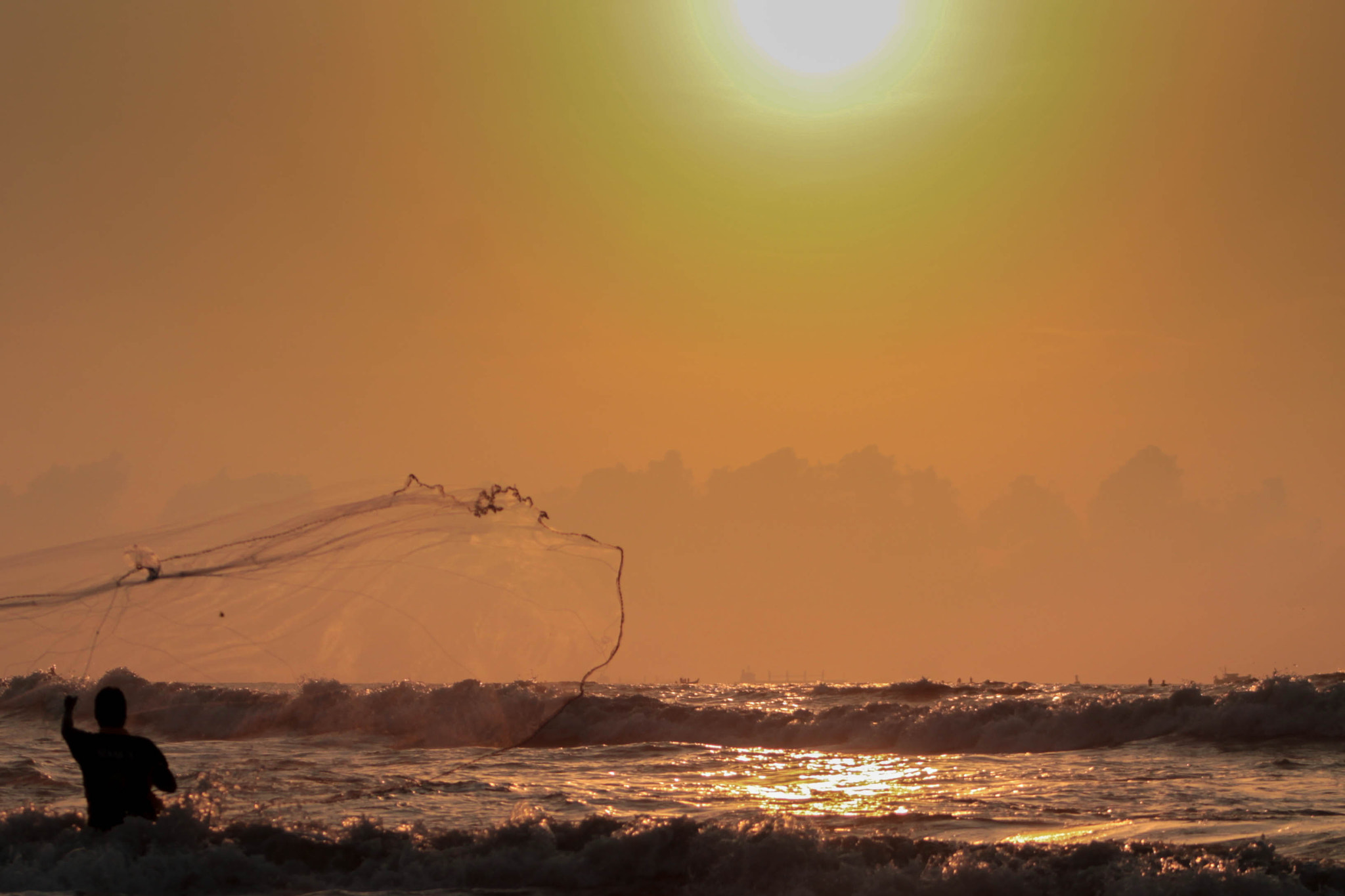 Canon EF 75-300mm f/4-5.6 USM sample photo. Fisherman photography