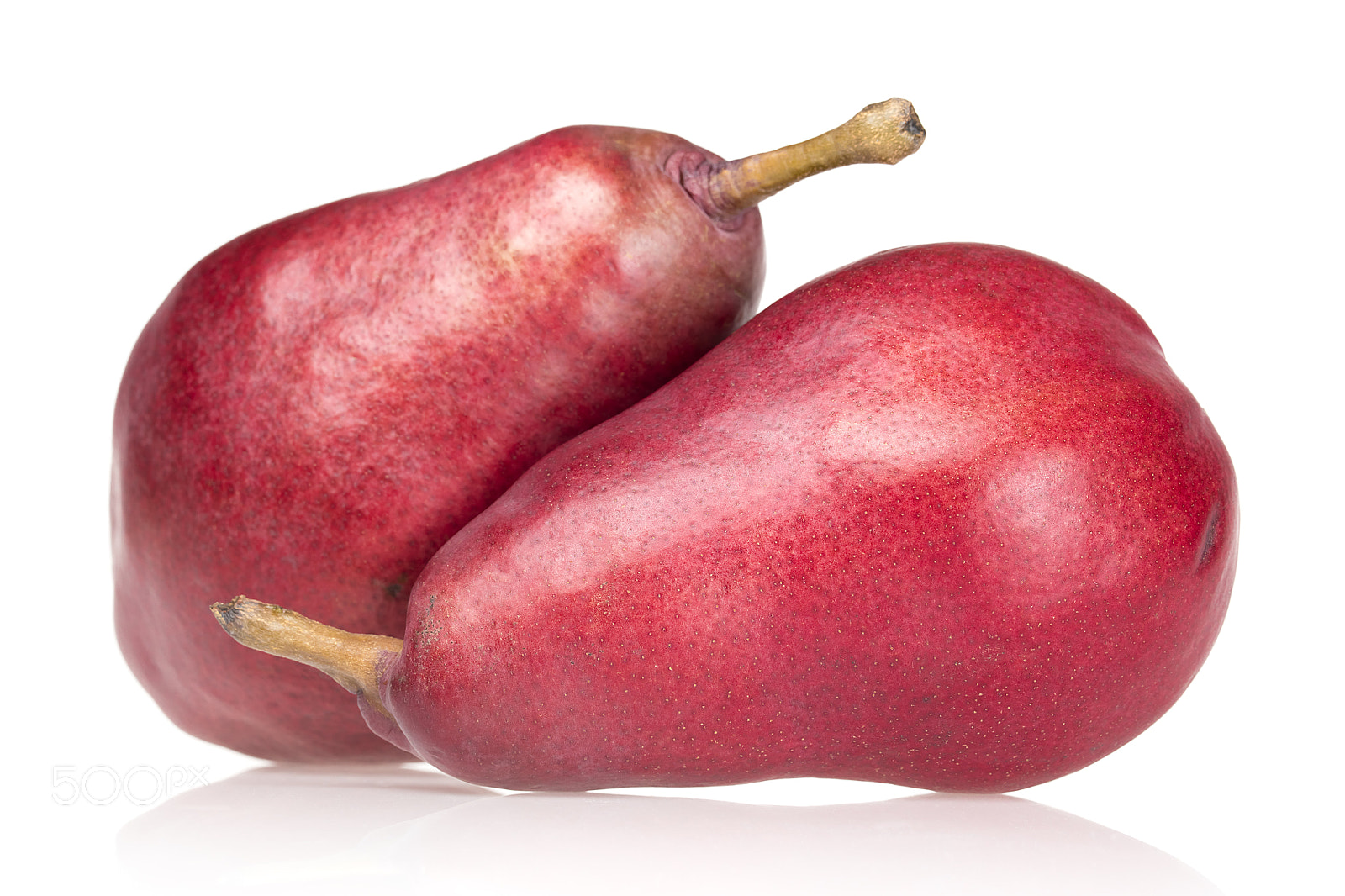 Canon EF 100mm F2.8L Macro IS USM sample photo. Red pear on white background photography