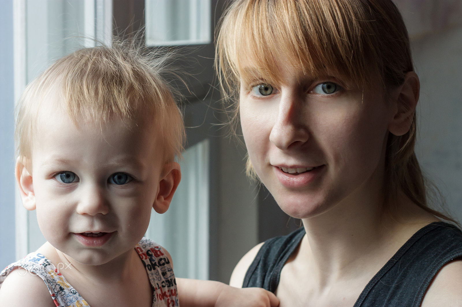 Canon EOS 450D (EOS Rebel XSi / EOS Kiss X2) sample photo. Young woman with a son photography