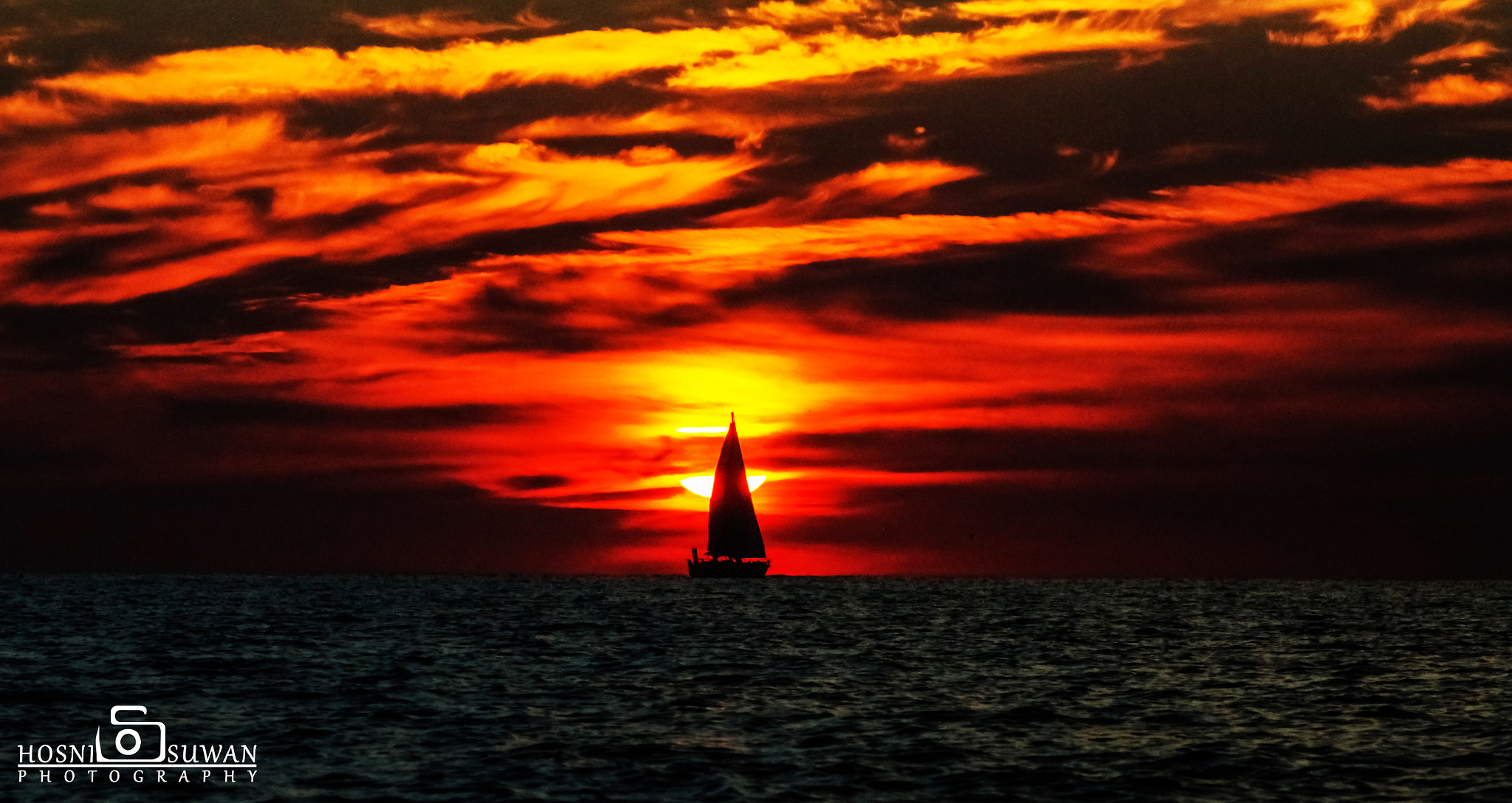 Canon EF 75-300mm f/4-5.6 USM sample photo. The sunset boat photography
