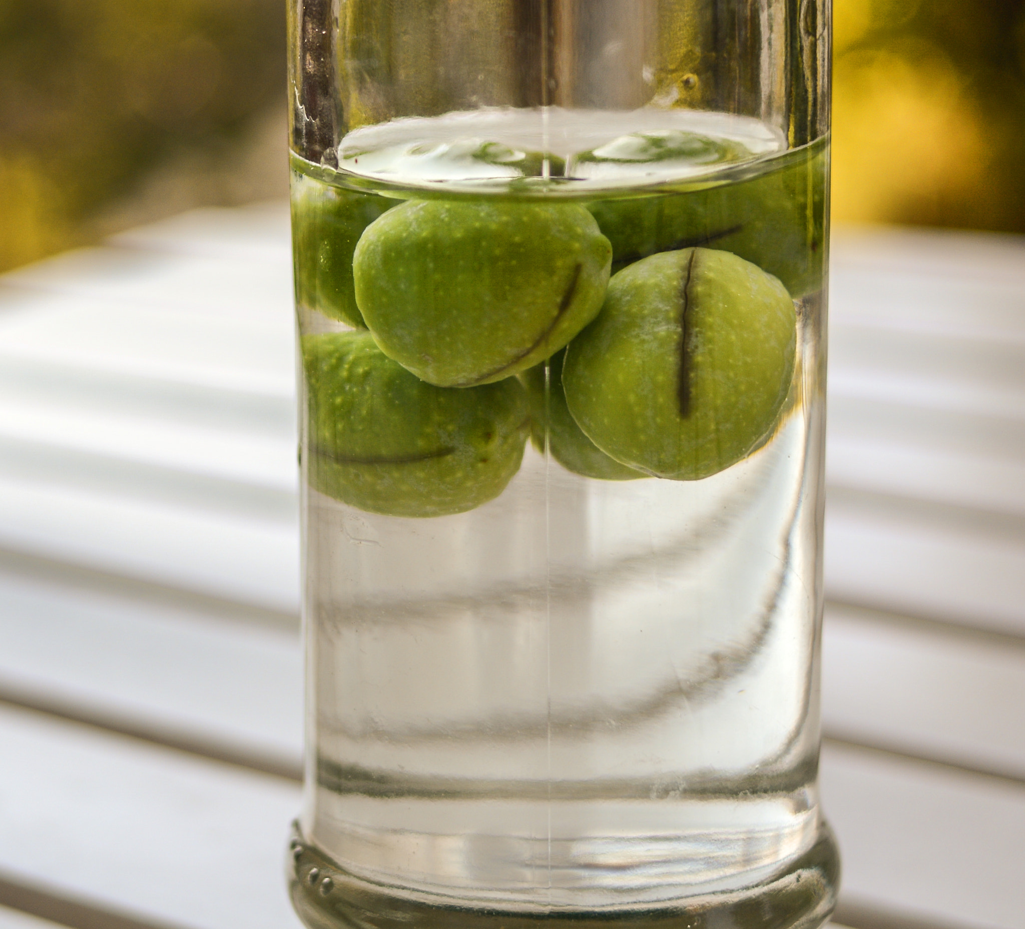 Nikon D7100 + AF Nikkor 28mm f/2.8 sample photo. Olives in brine photography