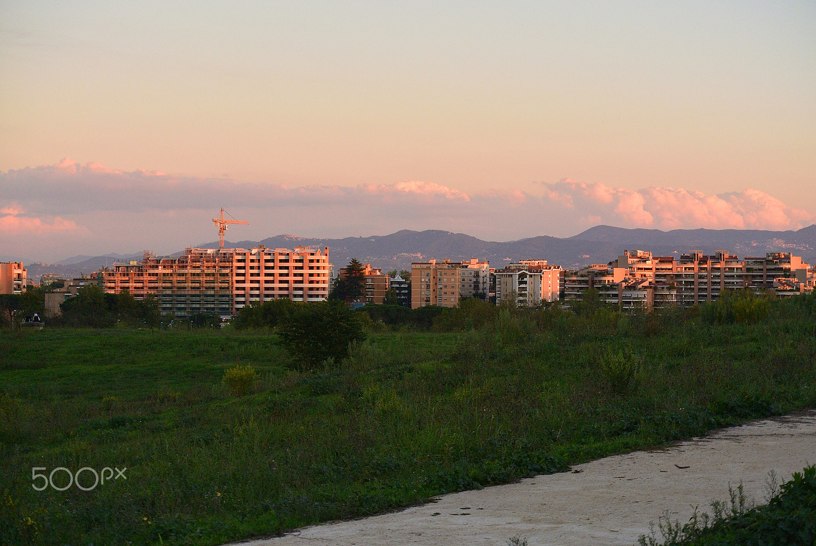 Nikon 1 S1 sample photo. Suburban sunset in rome. photography