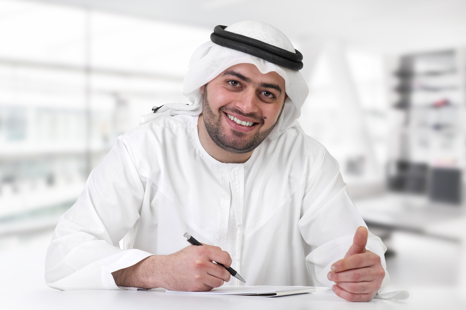 arabian businessman working in his office