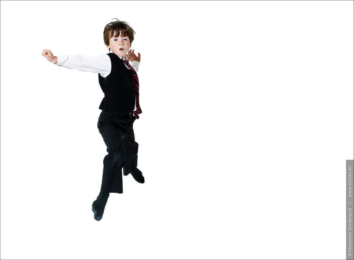 Sony a99 II sample photo. Expressive red-haired freckled boy shooting in the fly while jum photography