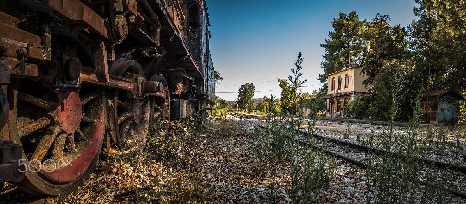 Canon EOS 650D (EOS Rebel T4i / EOS Kiss X6i) + Sigma 18-50mm f/2.8 Macro sample photo. Train depository site... (greece) photography