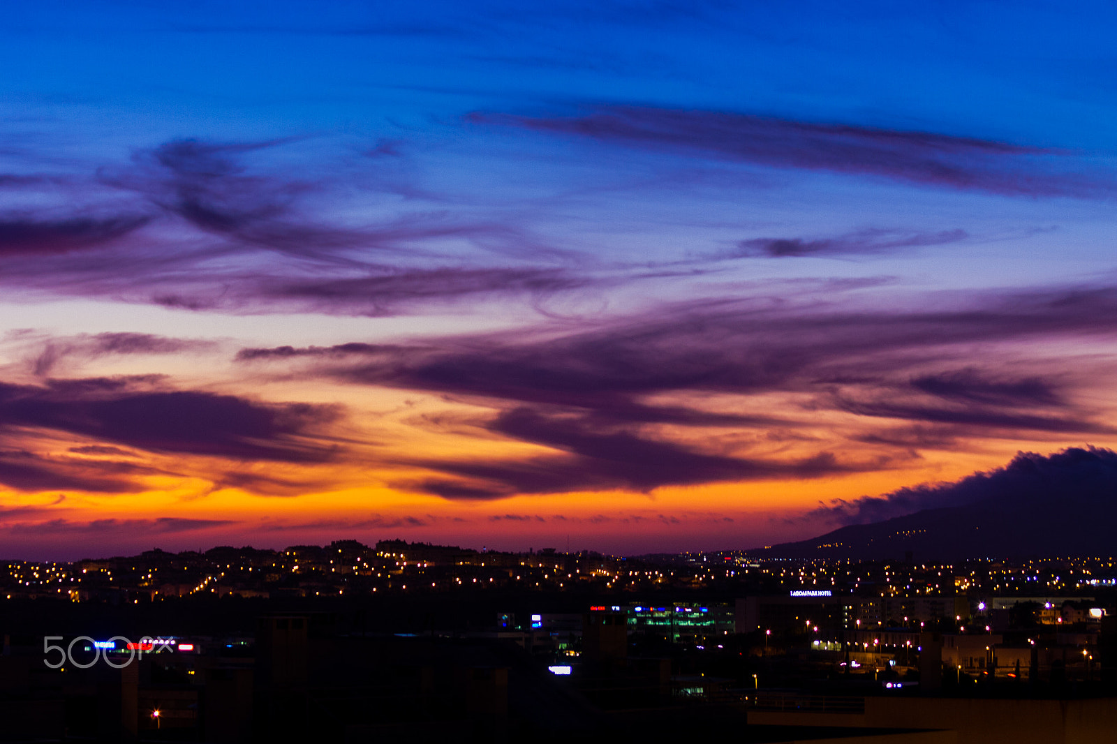 Canon EF 75-300mm F4.0-5.6 IS USM sample photo. Sunset over cascais, portugal photography