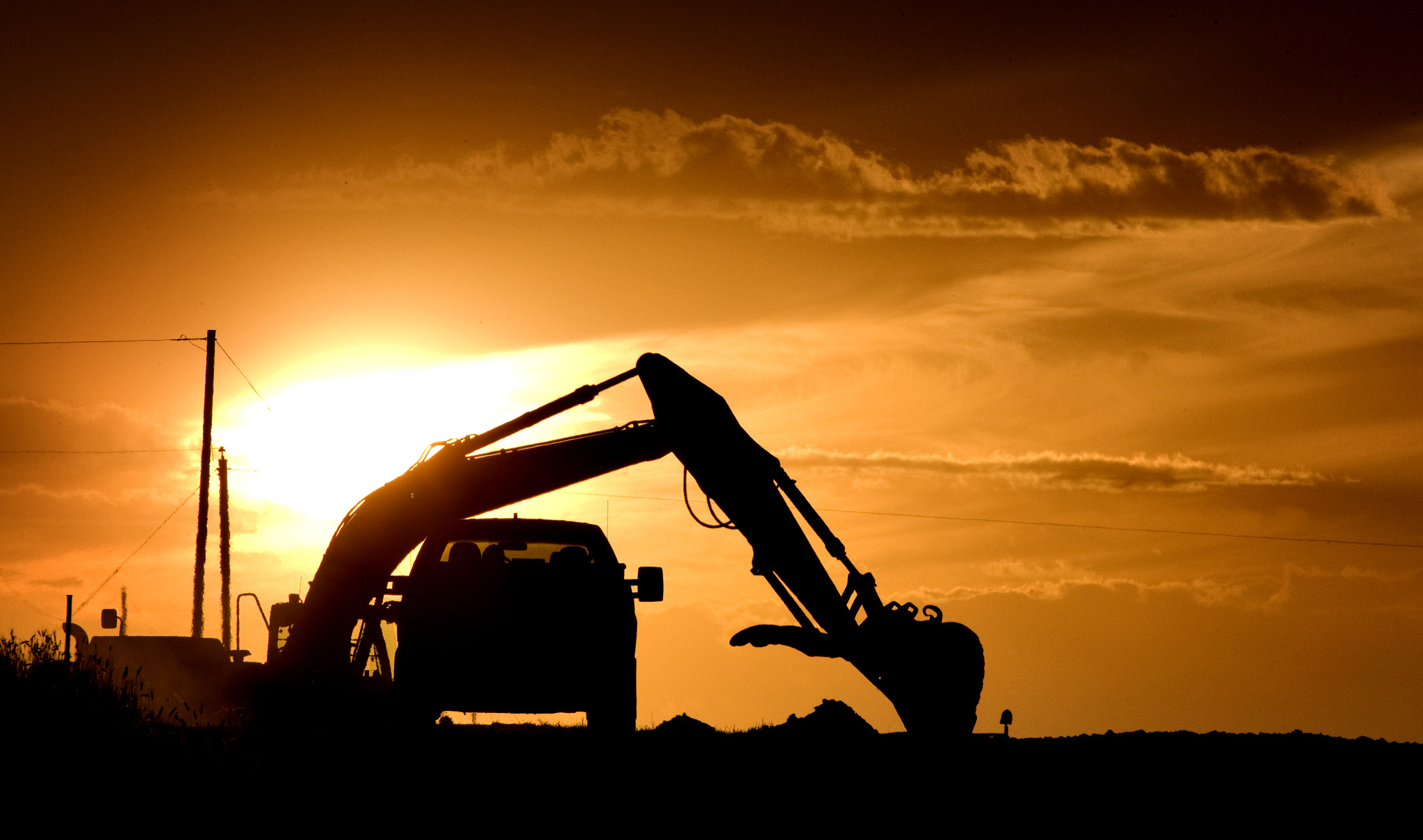 Canon EF 100-400mm F4.5-5.6L IS USM sample photo. Construction sunset photography