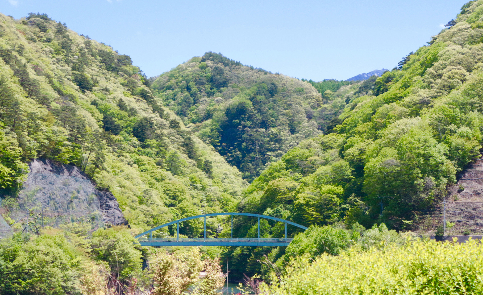 Canon EF-S 18-55mm F3.5-5.6 IS II sample photo. A blue bridge connecting mountains in interior japan photography
