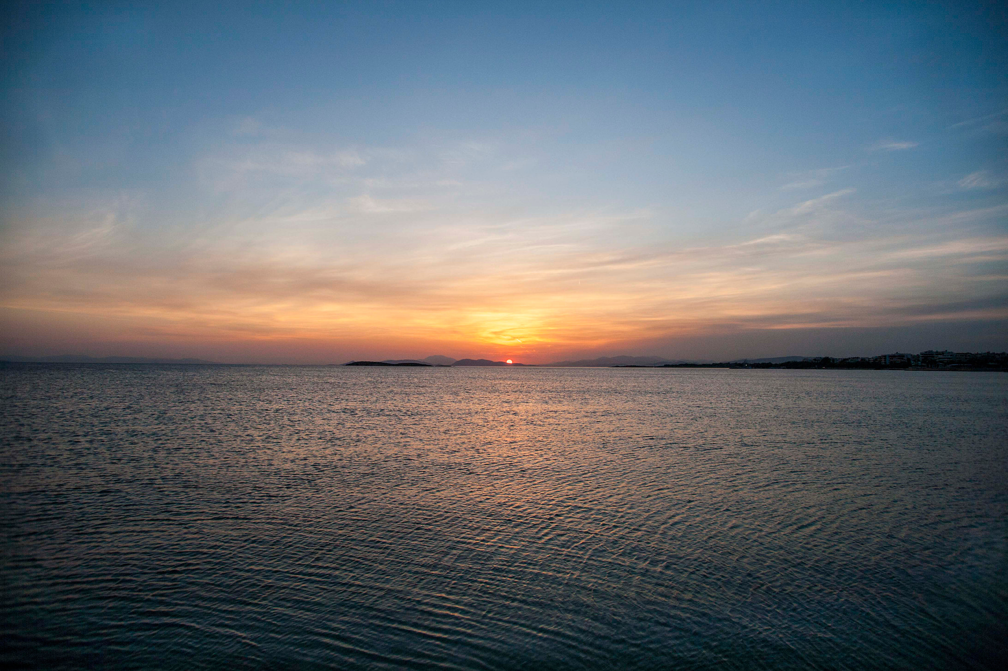 Canon EOS 5D + Canon EF 20-35mm f/2.8L sample photo. A sunset in a steely blue photography