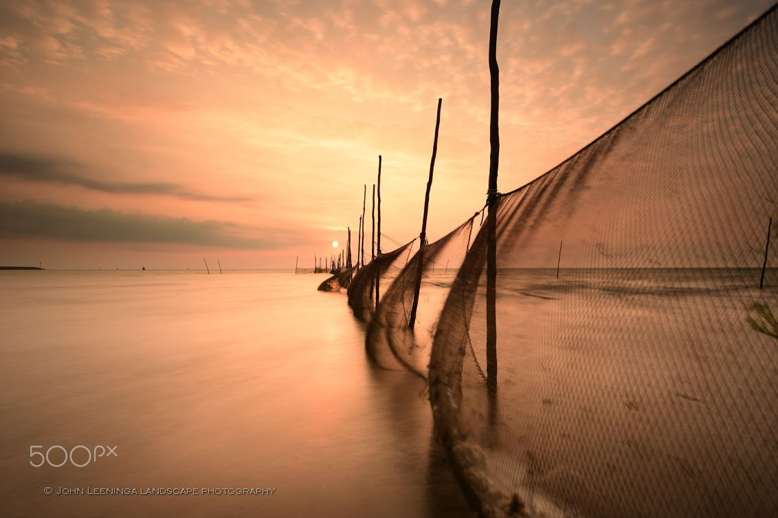 Nikon D7200 sample photo. Fishing nets at sunrise photography