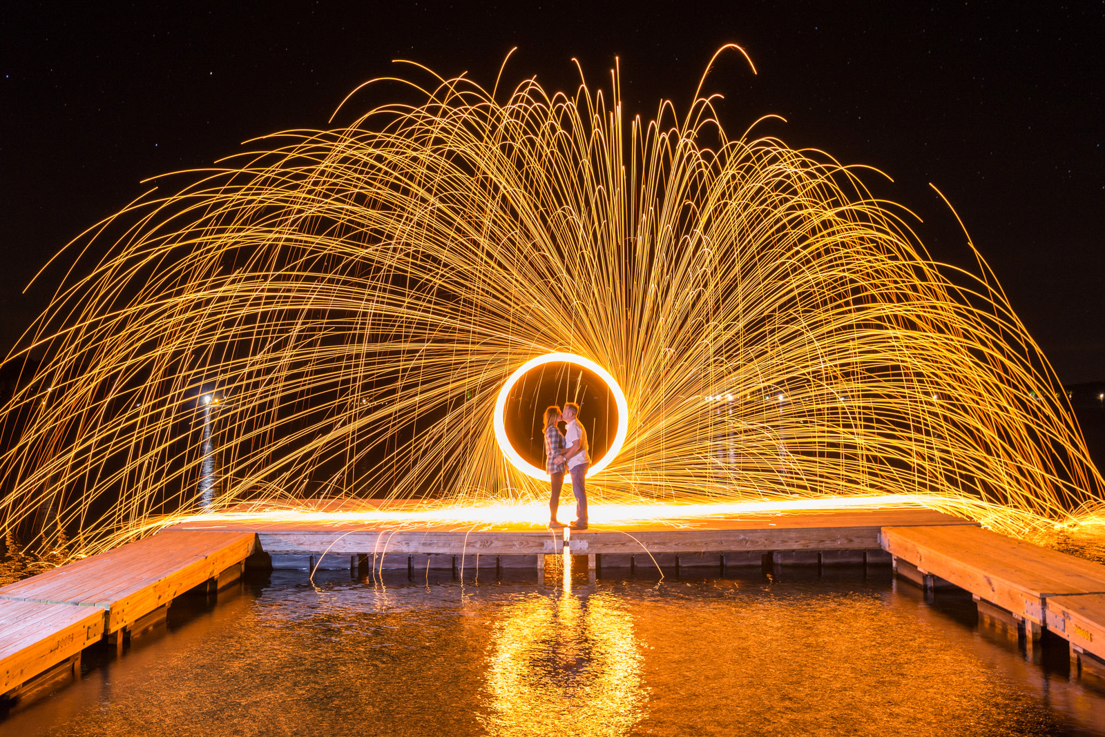 Nikon D600 + Tamron SP 15-30mm F2.8 Di VC USD sample photo. Steel wool spinning engagement kiss photography