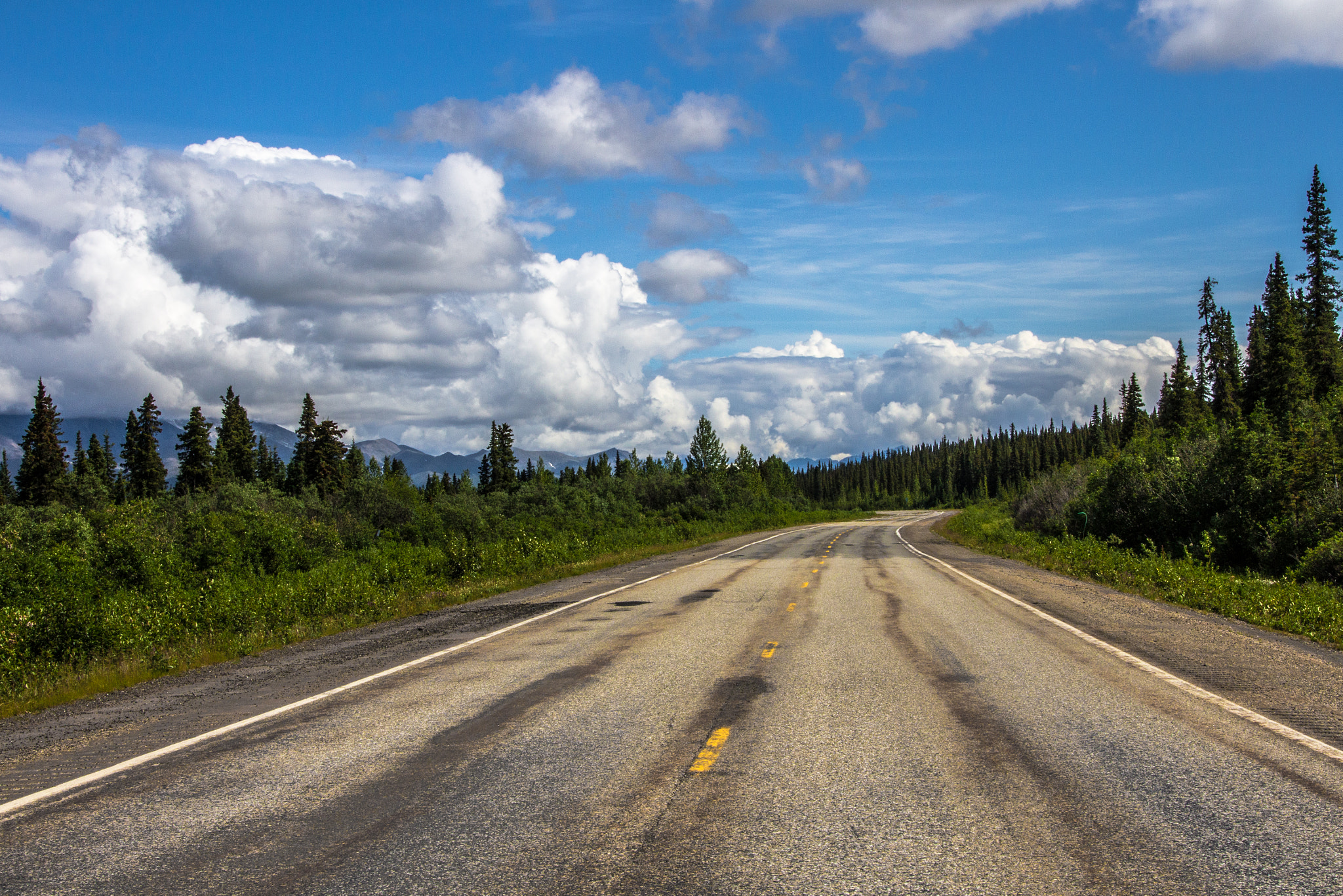 Canon EOS 7D + Sigma 18-200mm f/3.5-6.3 DC OS HSM [II] sample photo. The alaska highway heading north towards denali photography