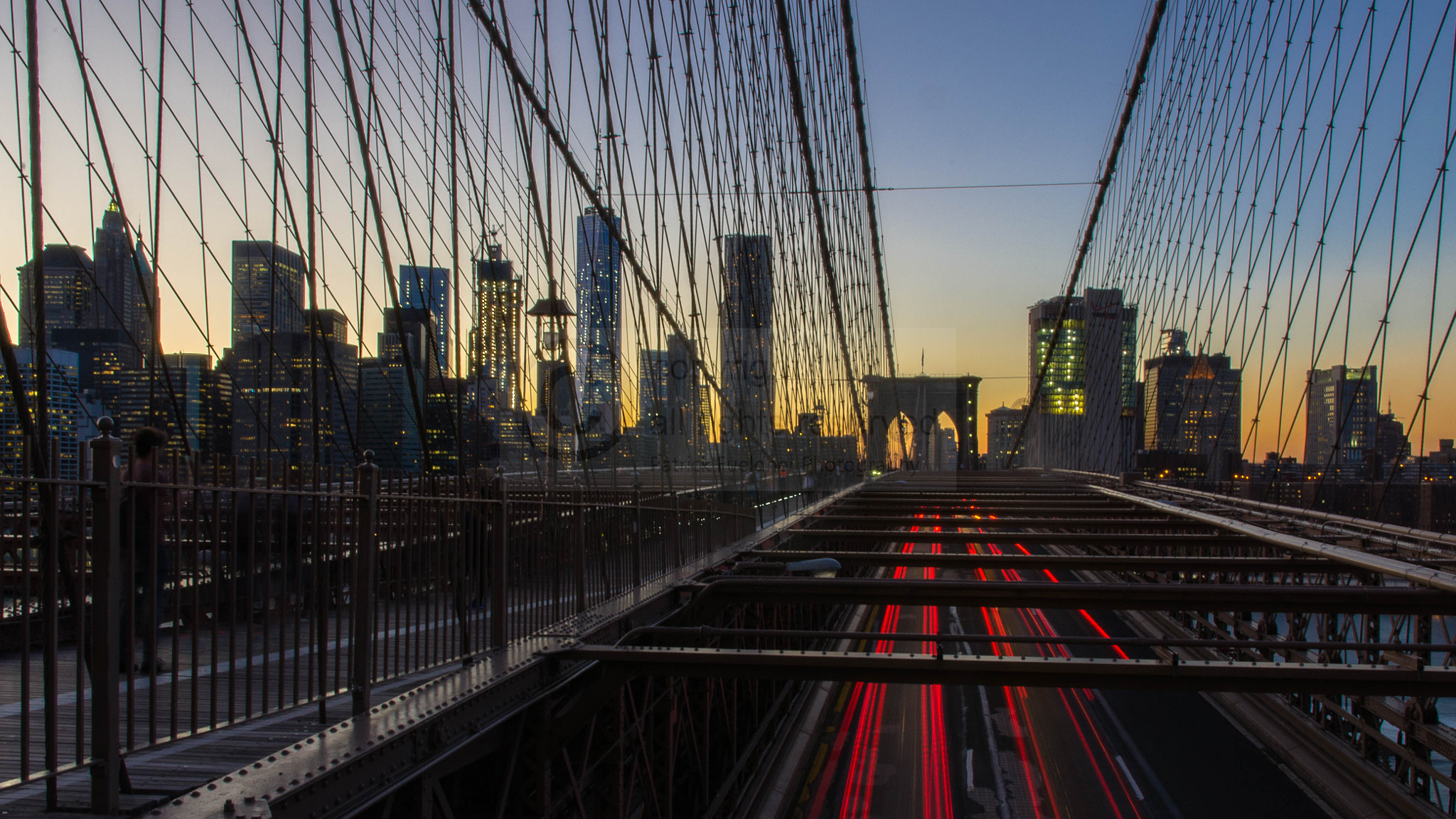 Pentax K-r sample photo. Brooklyn bridge, manhattan skyline and red light trails at dawn photography