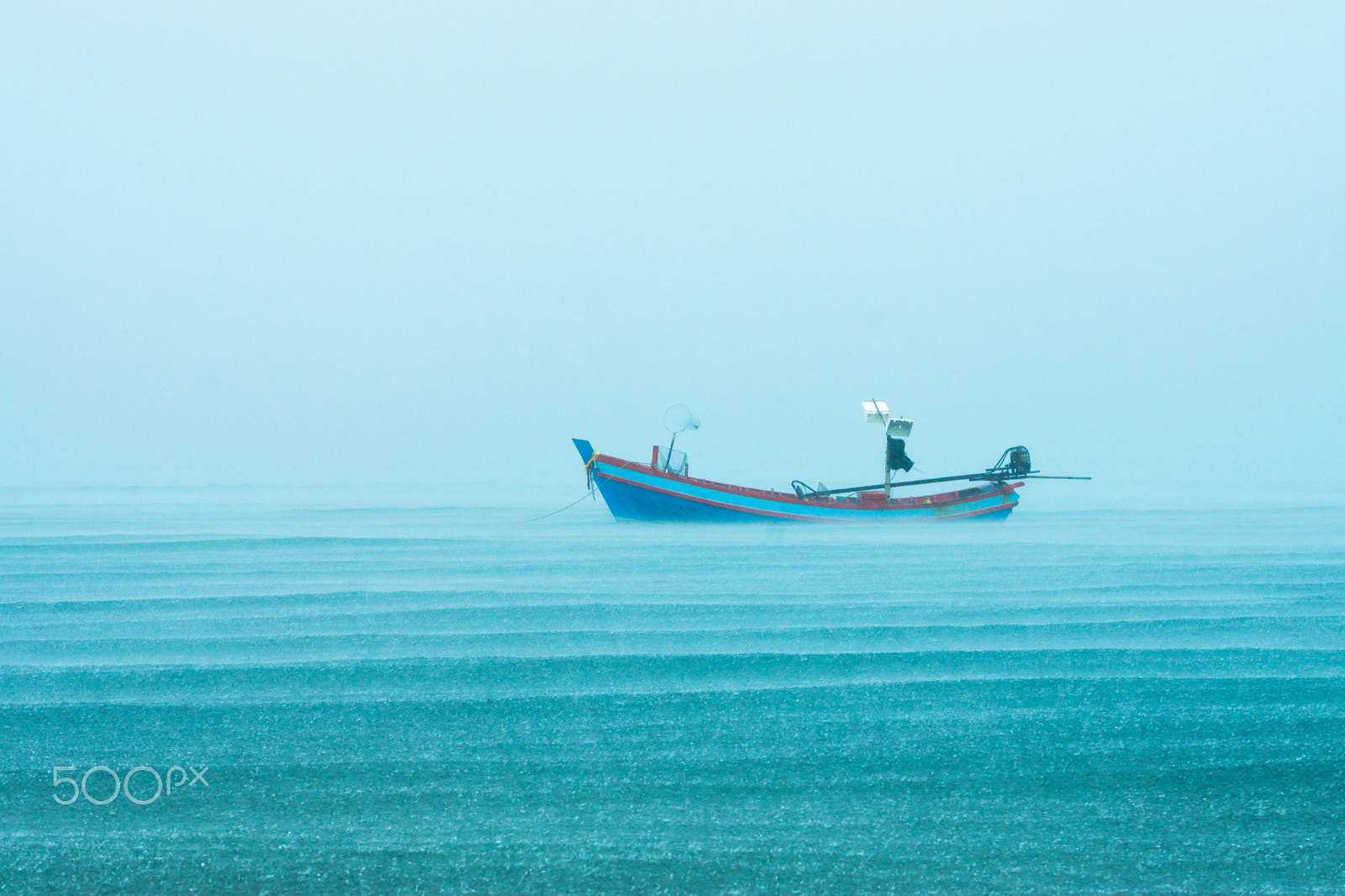 Sony SLT-A77 + Sony DT 55-300mm F4.5-5.6 SAM sample photo. Fishing boat in the rainfall on the sea. photography