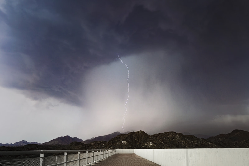 Canon TS-E 24.0mm f/3.5 L II sample photo. Rain storm & lightning strike photography