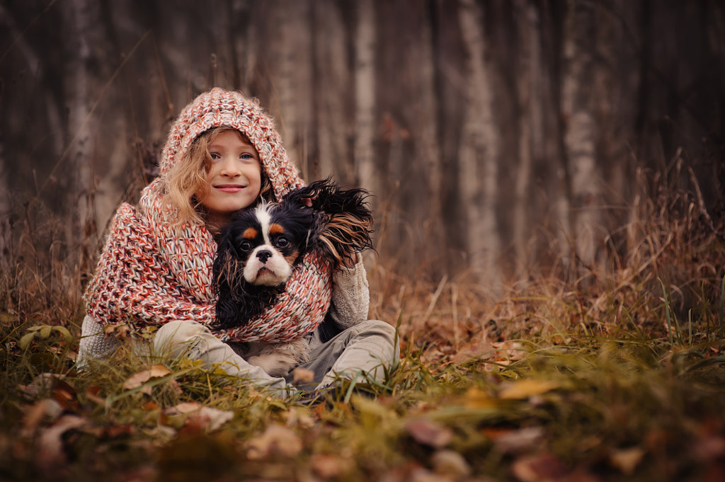 child girl playing with her dog in autumn by Maria Kovalevskaya on 500px.com