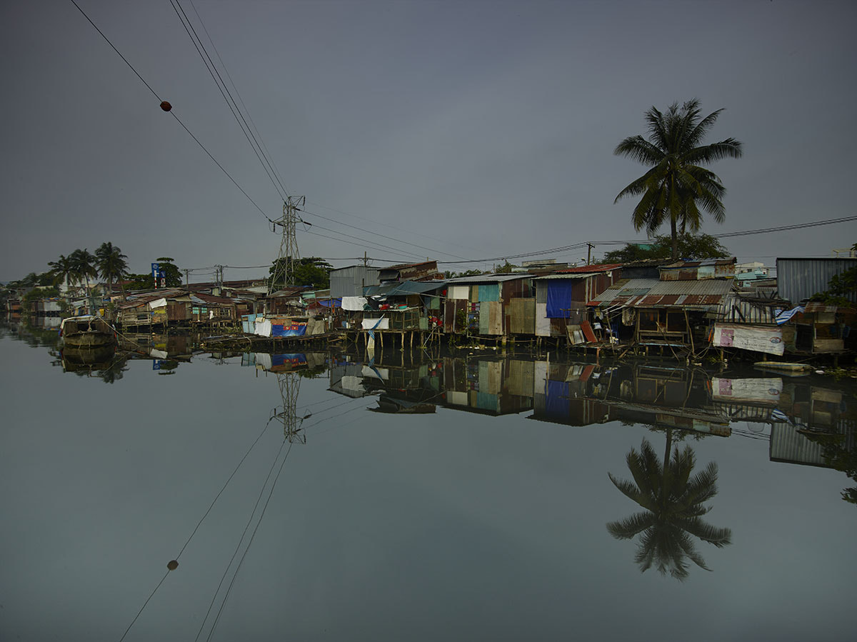 Phase One IQ260 sample photo. Slums at the kenh te canal saigon river early morning reflections photography