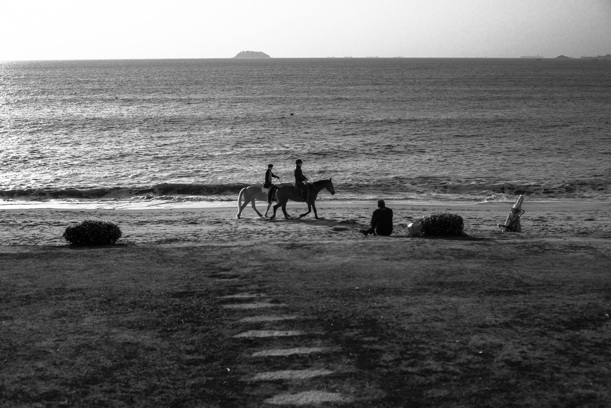 Nikon D800 + AF Nikkor 50mm f/1.4 sample photo. Horse riders on beach photography