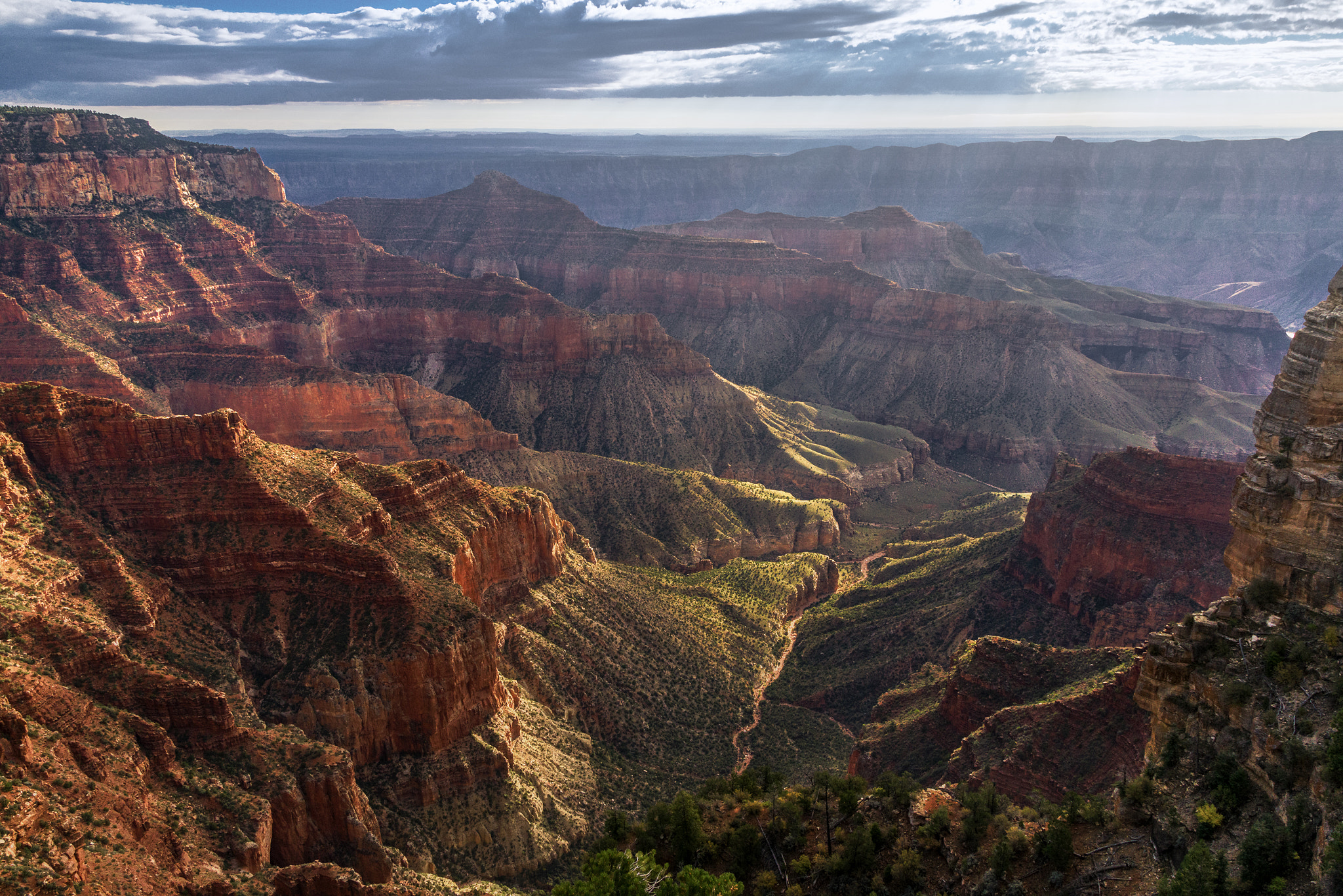 Sony a6000 + Canon EF-S 17-55mm F2.8 IS USM sample photo. Grand canyon north rim distant light channels photography