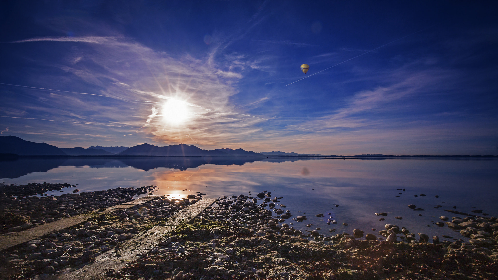Canon EOS 5D Mark II + Canon EF 16-35mm F4L IS USM sample photo. Sun over chiemsee/bavaria - kampenwand balloon photography