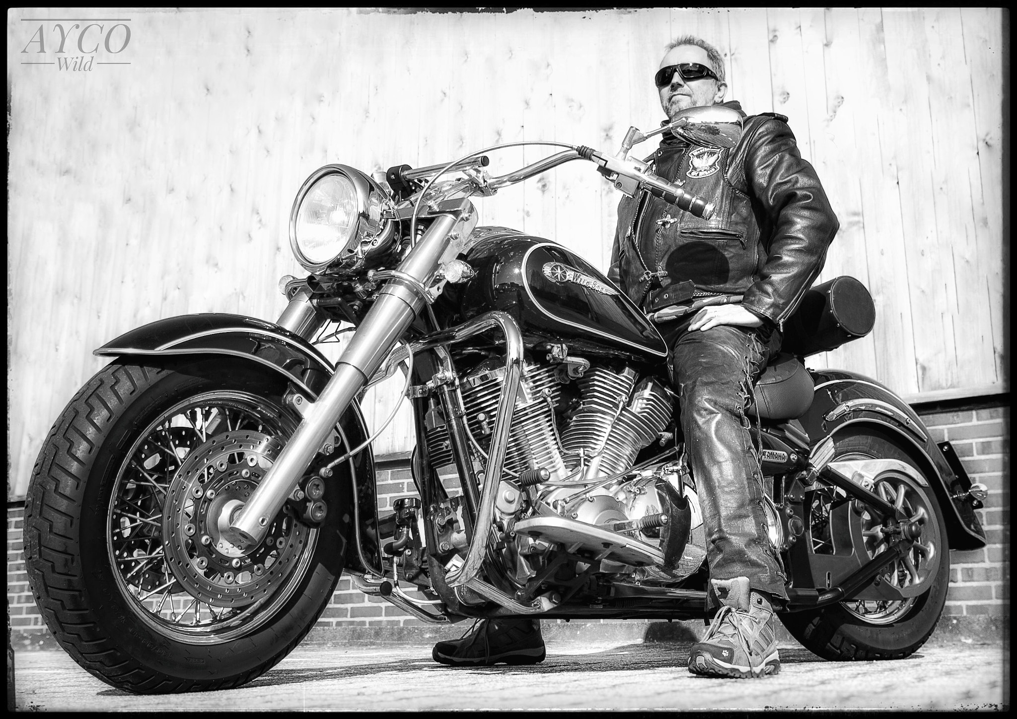 Tokina AT-X Pro 12-24mm F4 (IF) DX sample photo. Relaxing biker photography