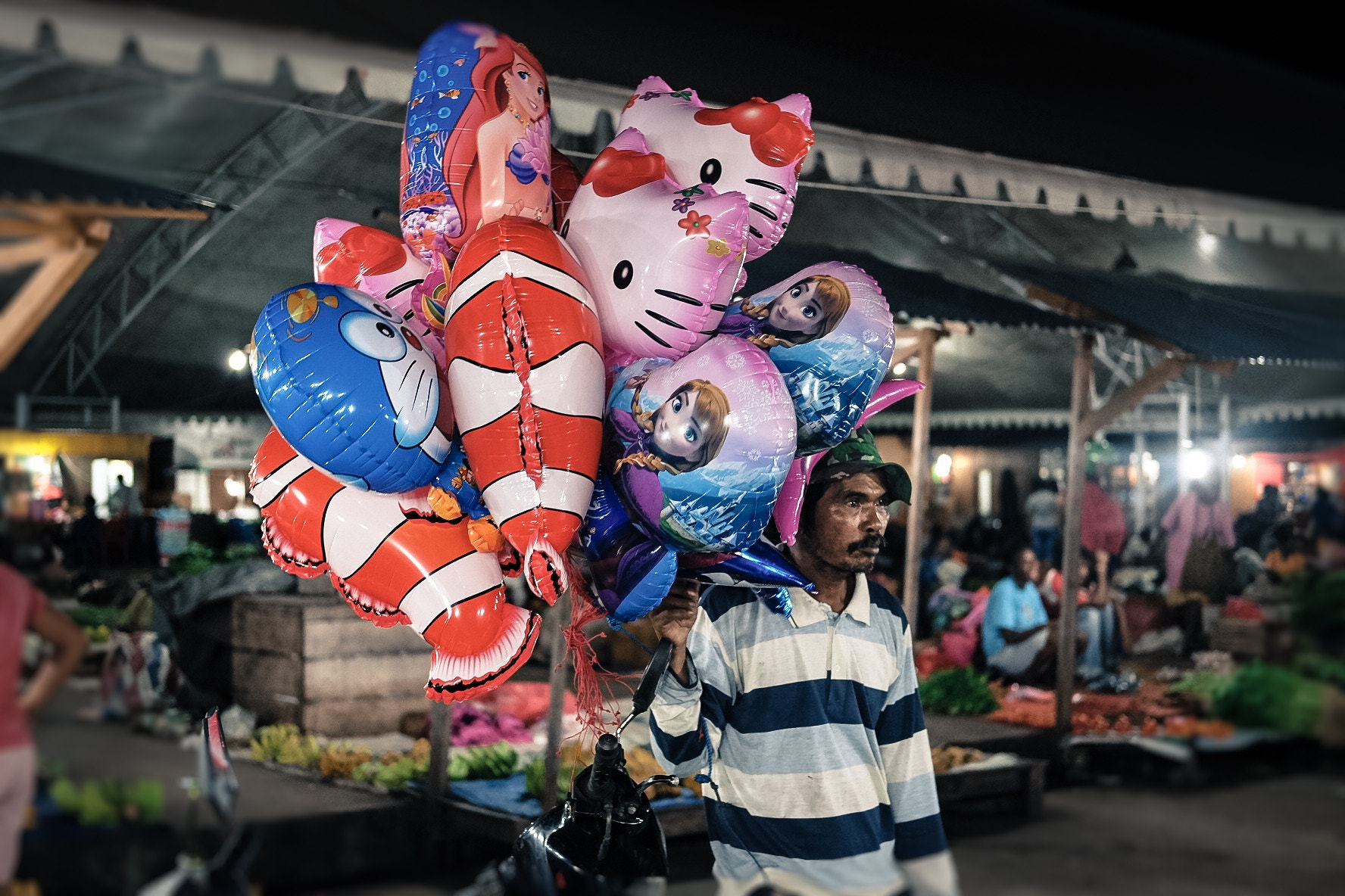 Fujifilm X-E2 + Fujifilm XF 35mm F2 R WR sample photo. What do you do for living? he sell happiness.. photography