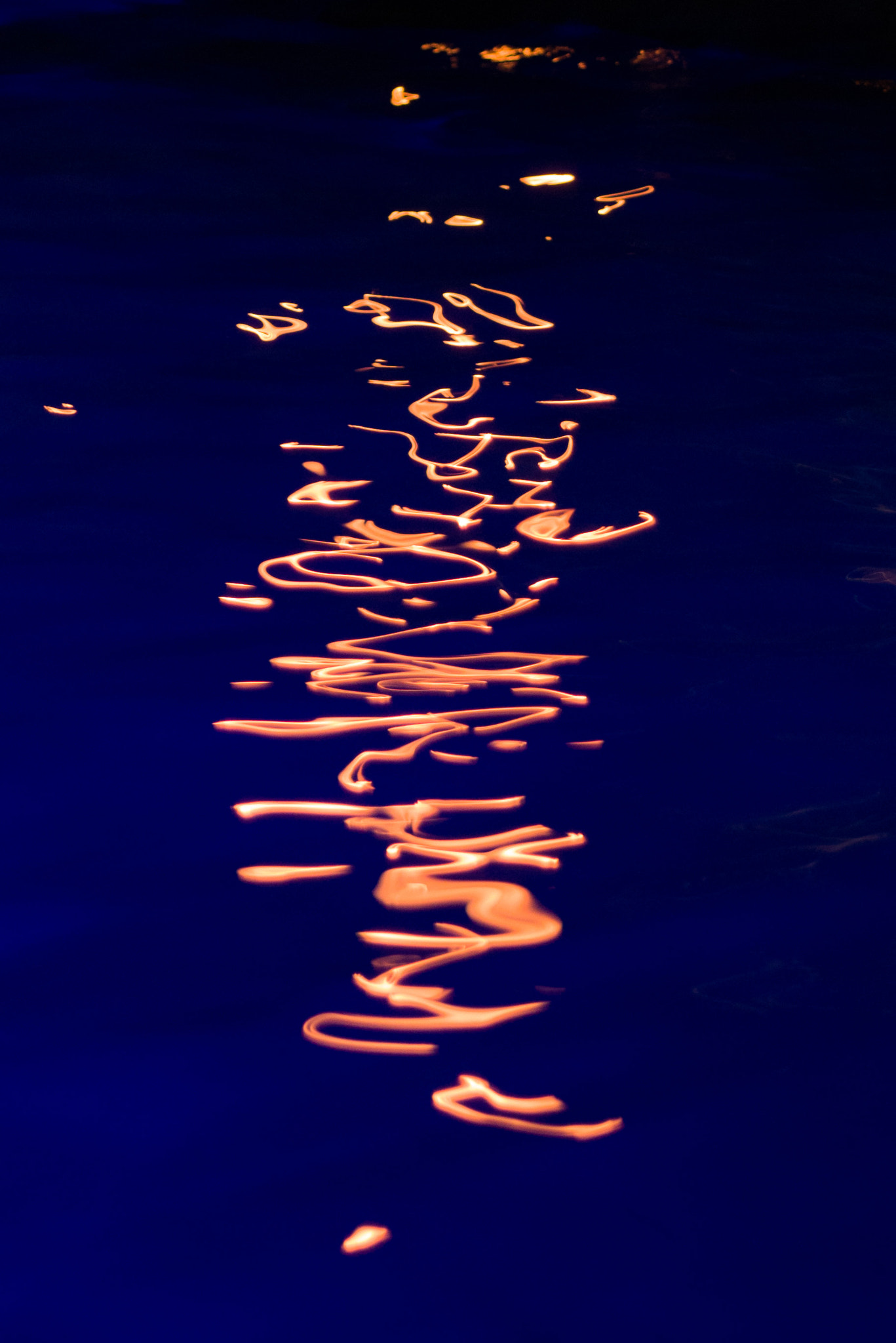 Nikon D750 + AF Zoom-Nikkor 28-80mm f/3.5-5.6D sample photo. Torch light over pool, port douglas photography