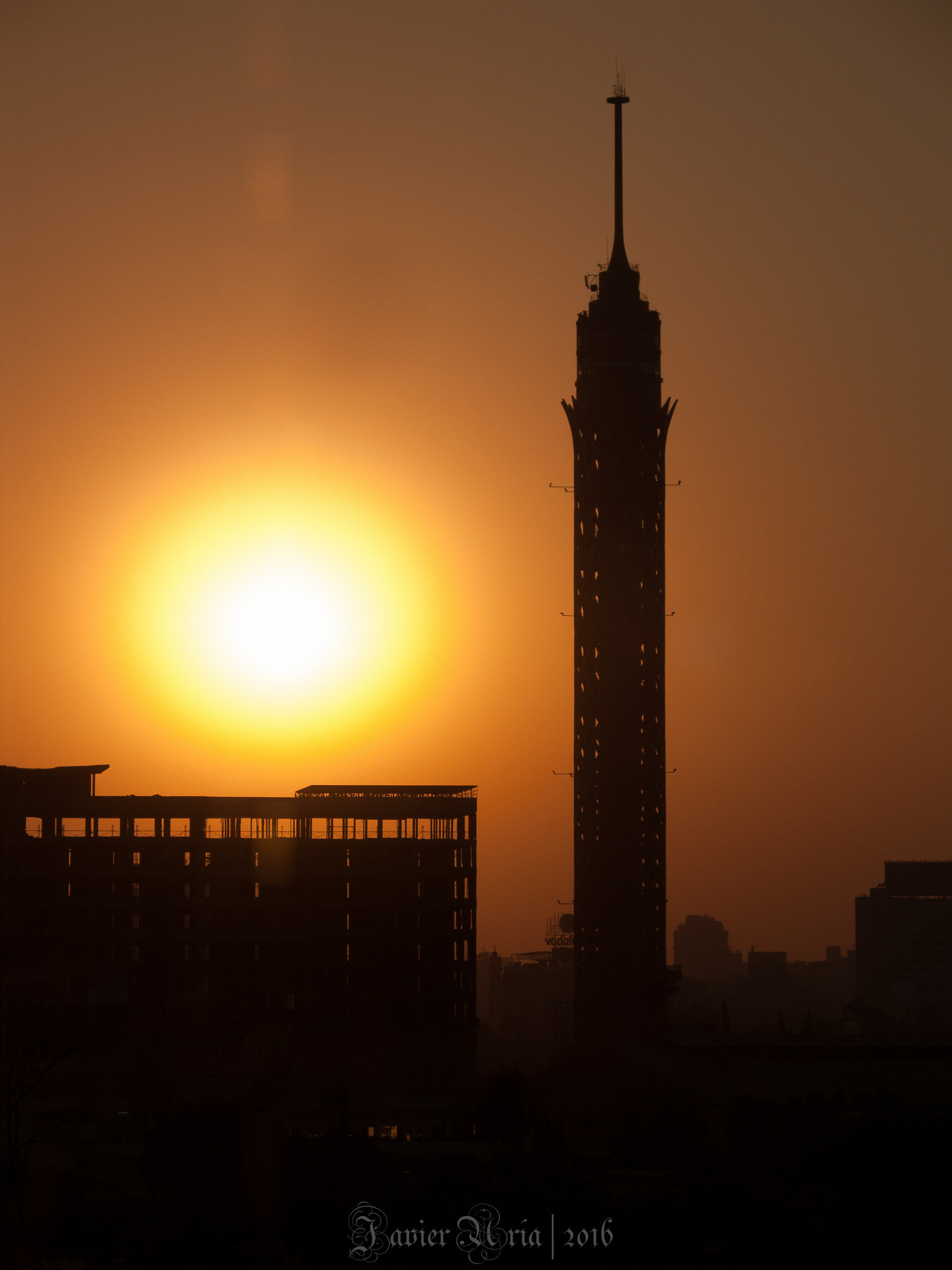 Canon POWERSHOT G5 sample photo. El cairo sunset through the window photography