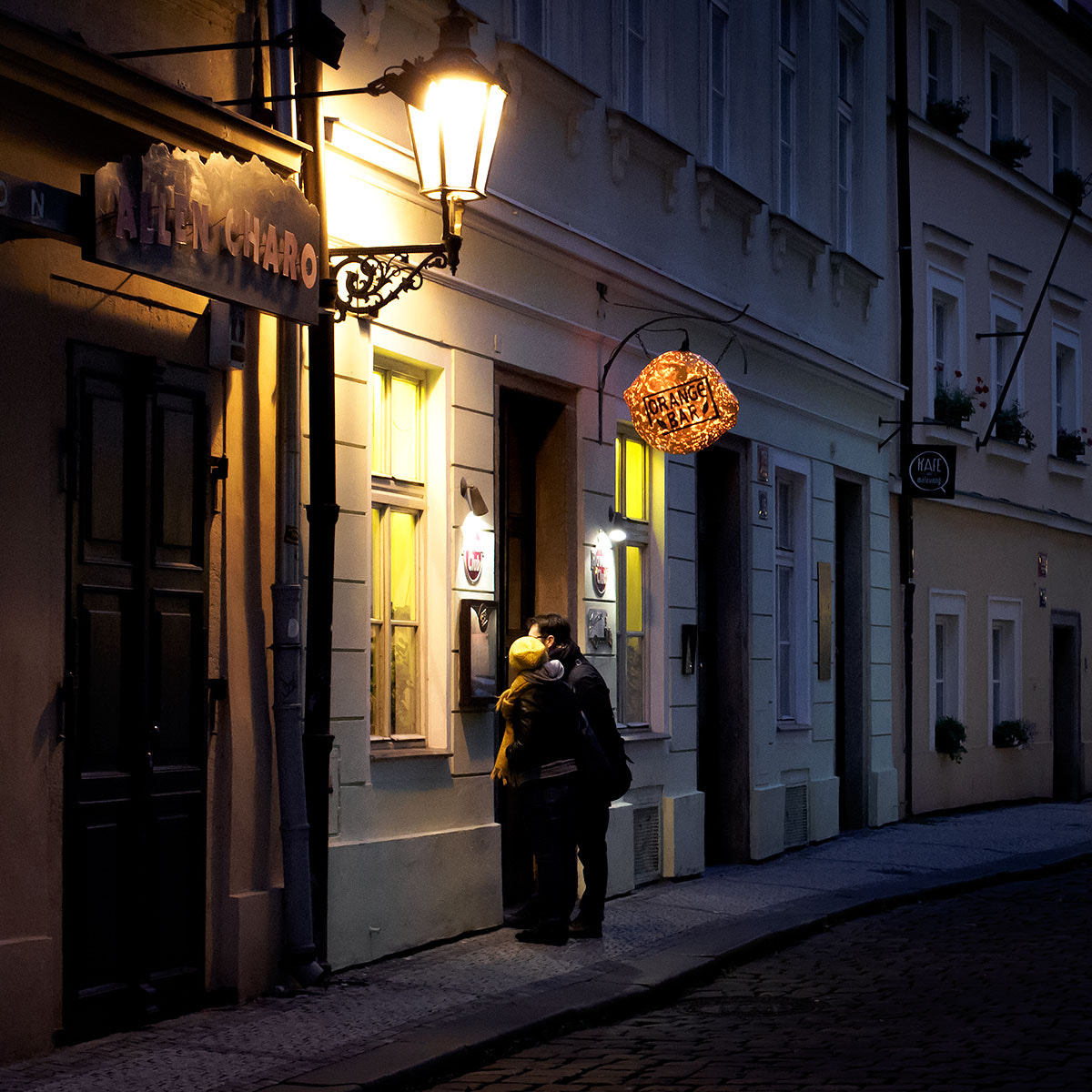 Olympus PEN E-PM2 + Sigma 30mm F2.8 DN Art sample photo. Prague evening street photography