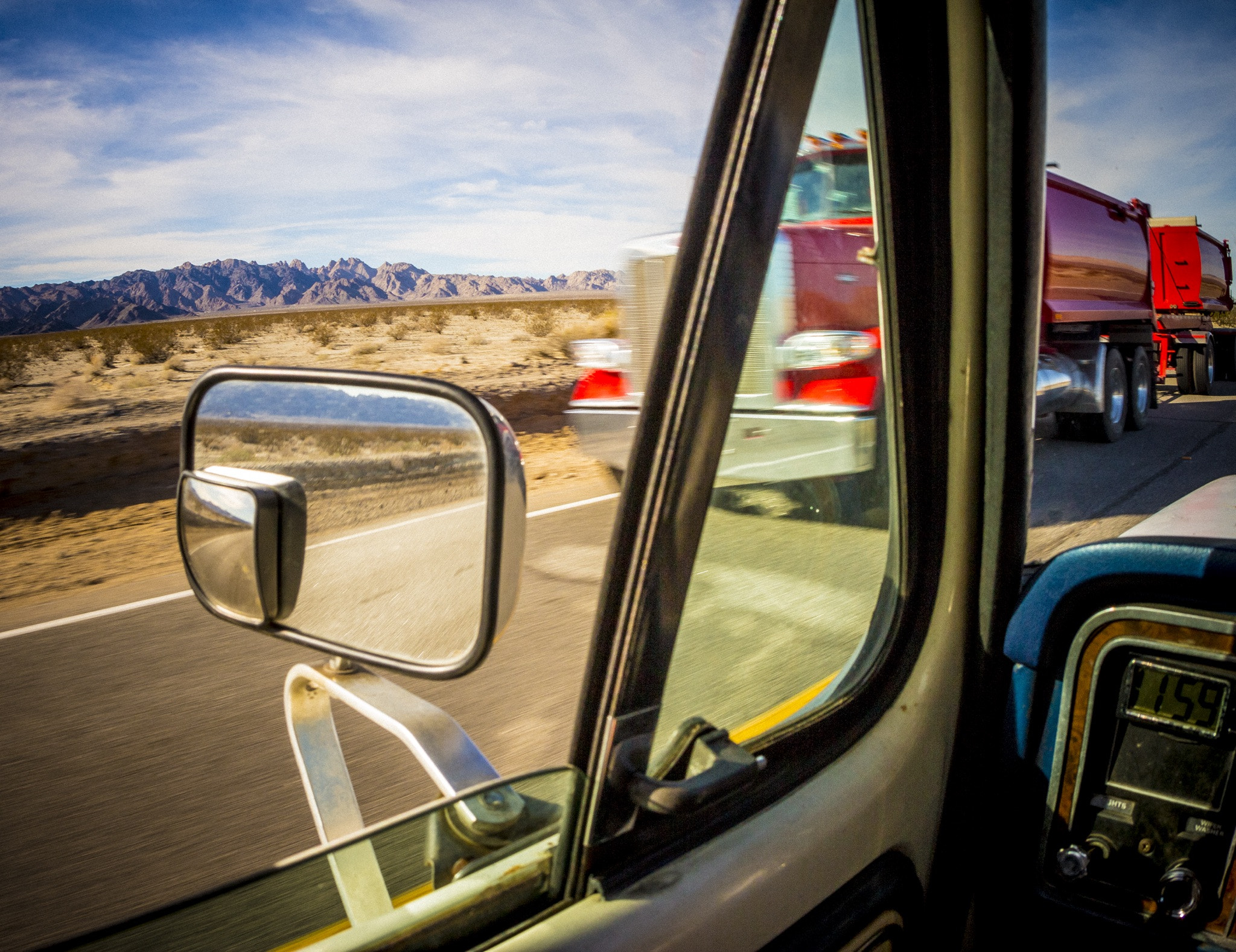 Canon EOS M + Canon EF 15mm F2.8 Fisheye sample photo. Red truck / photography