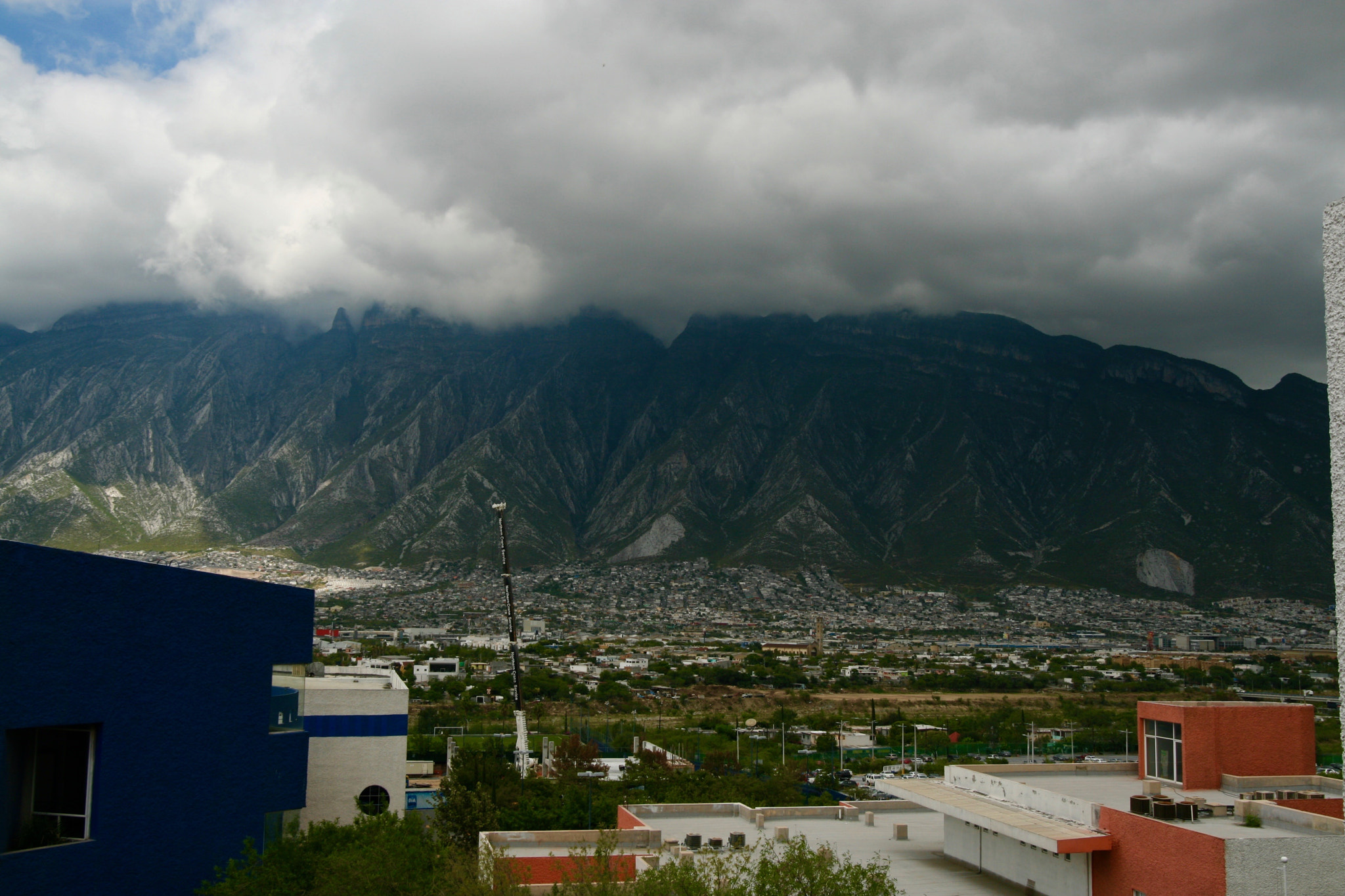 Canon EOS 400D (EOS Digital Rebel XTi / EOS Kiss Digital X) + Sigma 15-30mm f/3.5-4.5 EX DG Aspherical sample photo. Mountains in cloudy day. photography