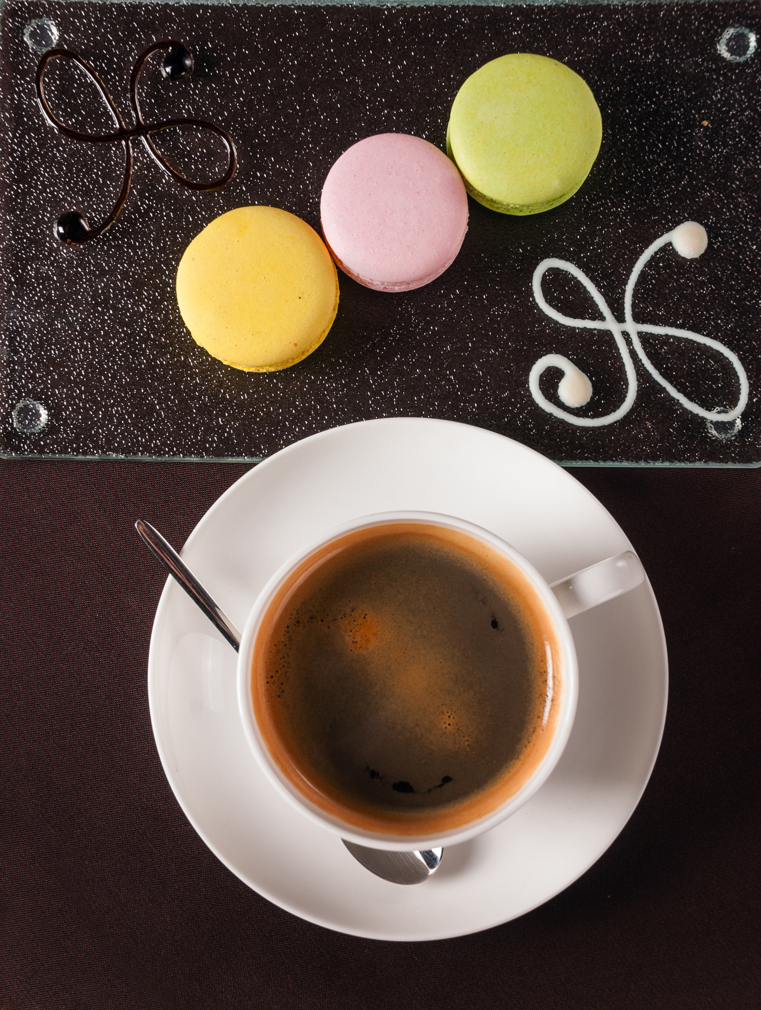 Nikon D60 sample photo. French macaroon dessert with a cup of coffee photography