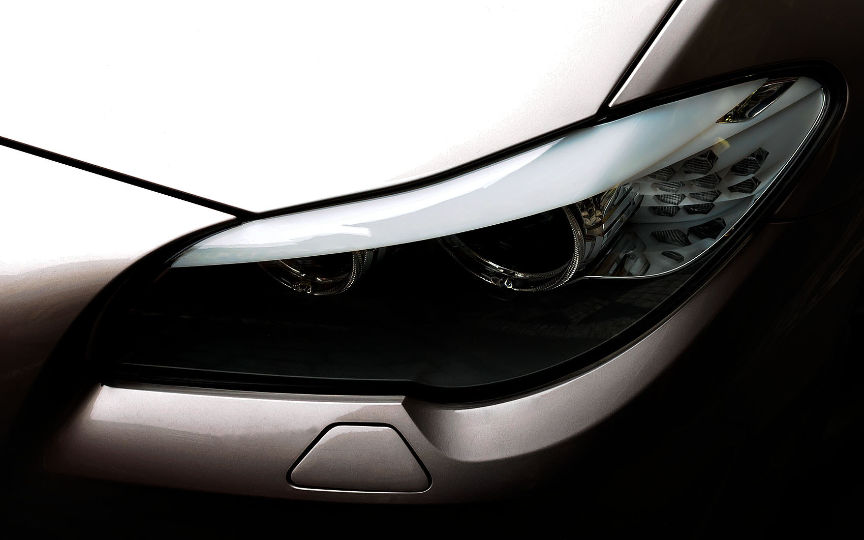 Olympus PEN E-PM2 + Sigma 30mm F2.8 DN Art sample photo. Bmw headlight photography