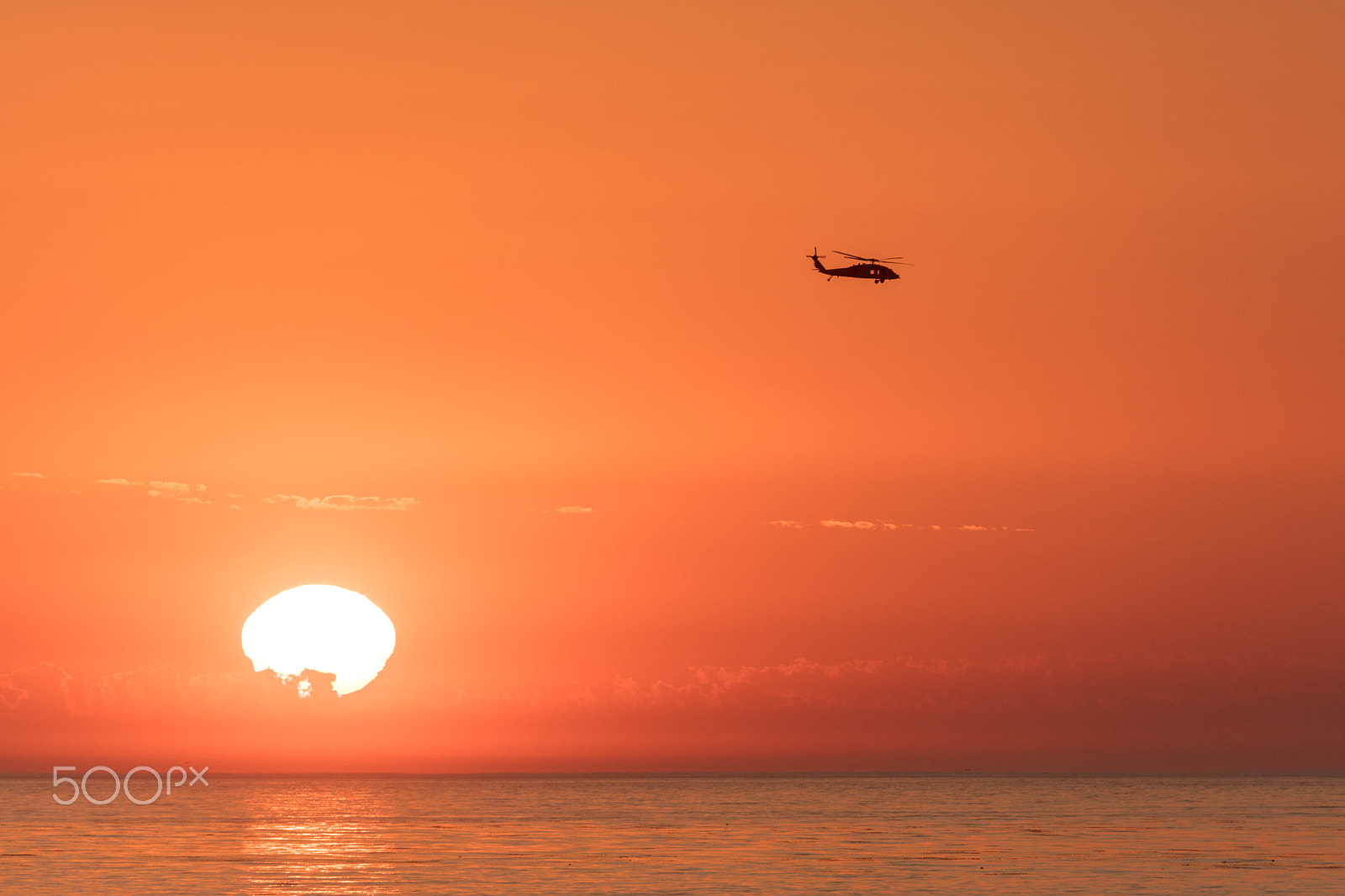 Canon EF 100-400mm F4.5-5.6L IS USM sample photo. Helicopter in san diego in front of sunset photography