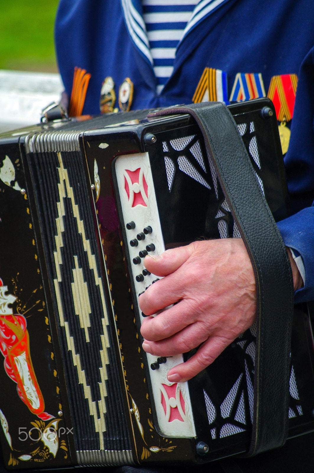 Pentax K-7 sample photo. Pleasent veteran plays accordion on the 69-th anniversary of the photography